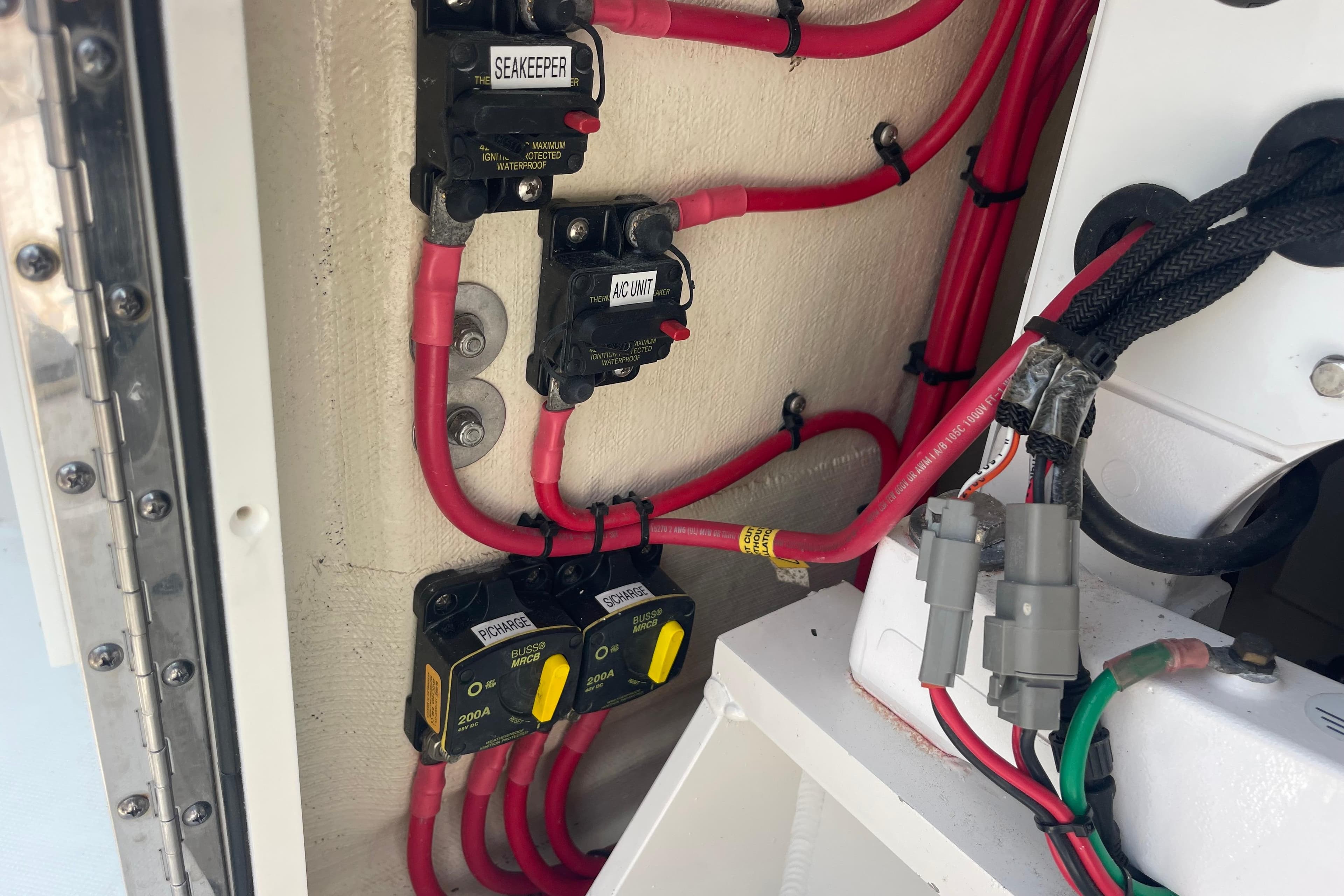 Electrical wiring and circuit breakers in a 2020 Jupiter 38 boat.