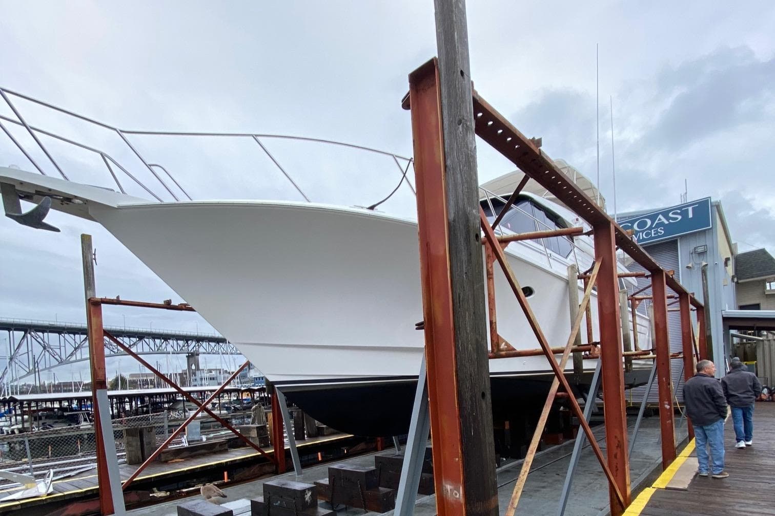 2001 West Bay 58 RPH yacht on dry dock at a marina.