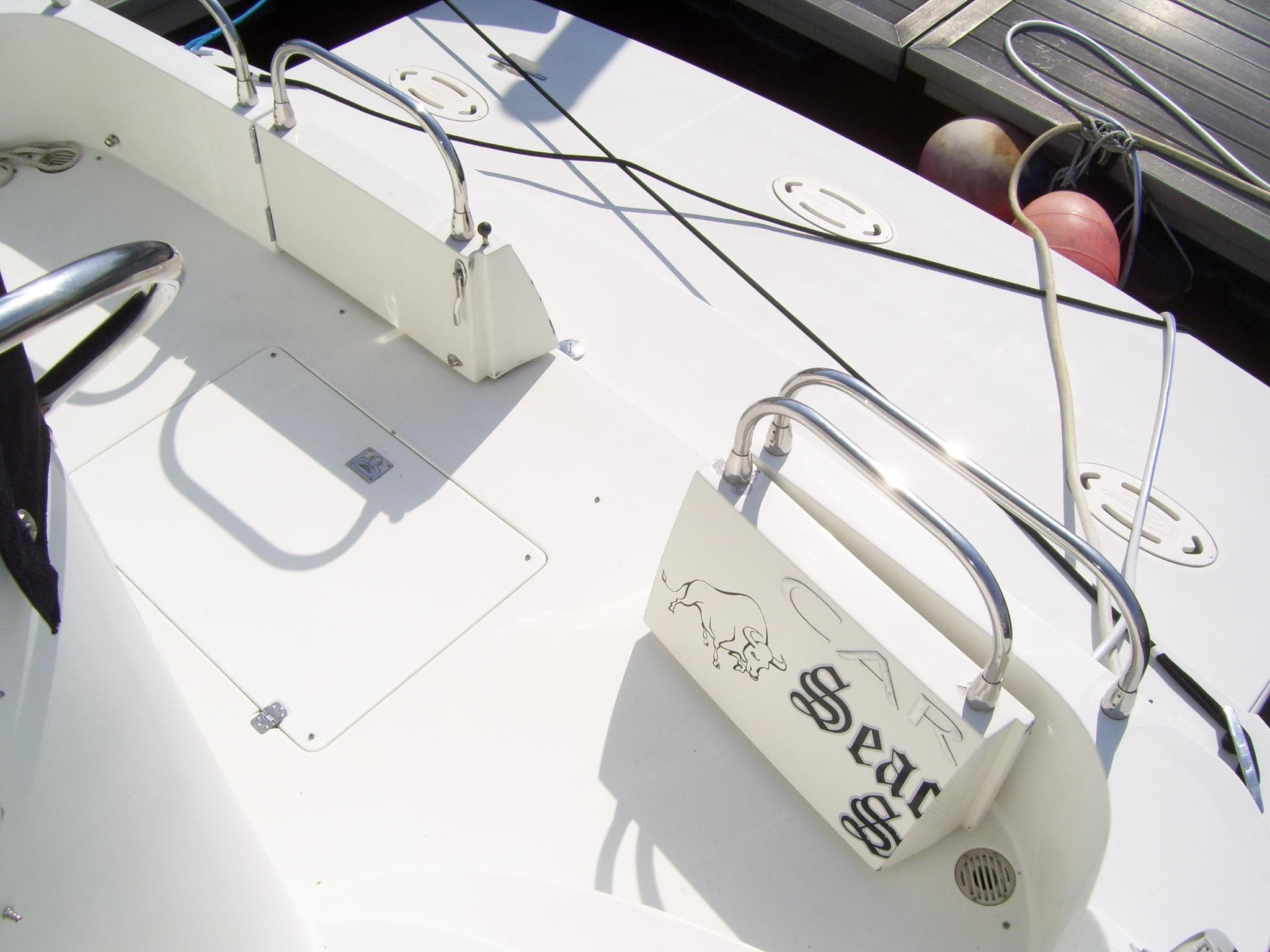 2007 Carver 43 Motor Yacht deck with railings and dock lines.