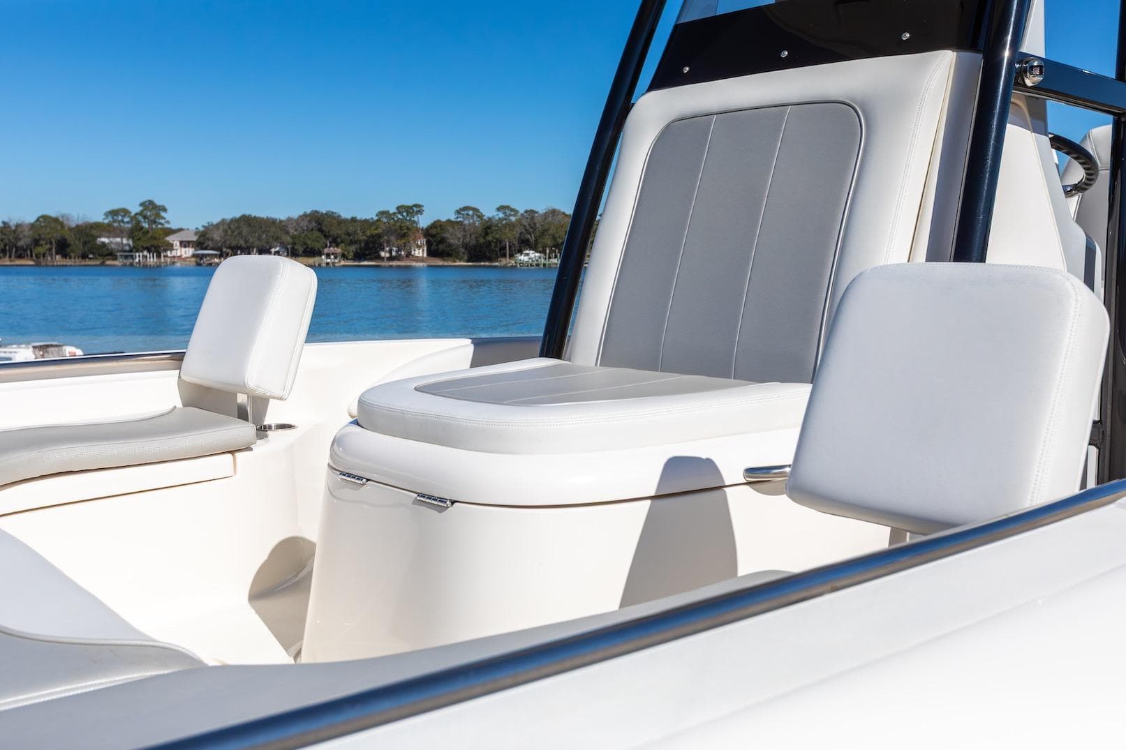 2023 ShearWater 260 SS Carolina boat interior with comfortable seating on a sunny day.