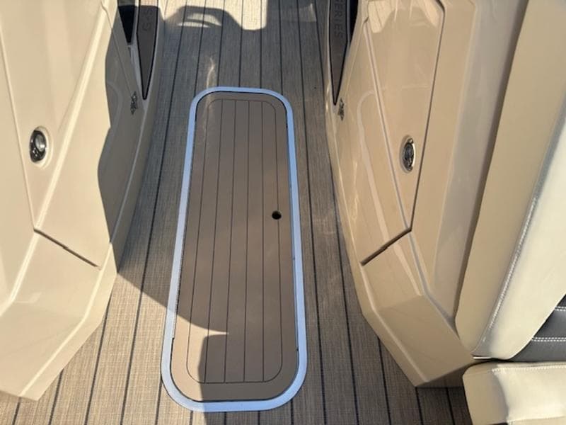 2025 Sylvan G-3 CLZ DC boat deck with sleek, modern design and storage compartment.