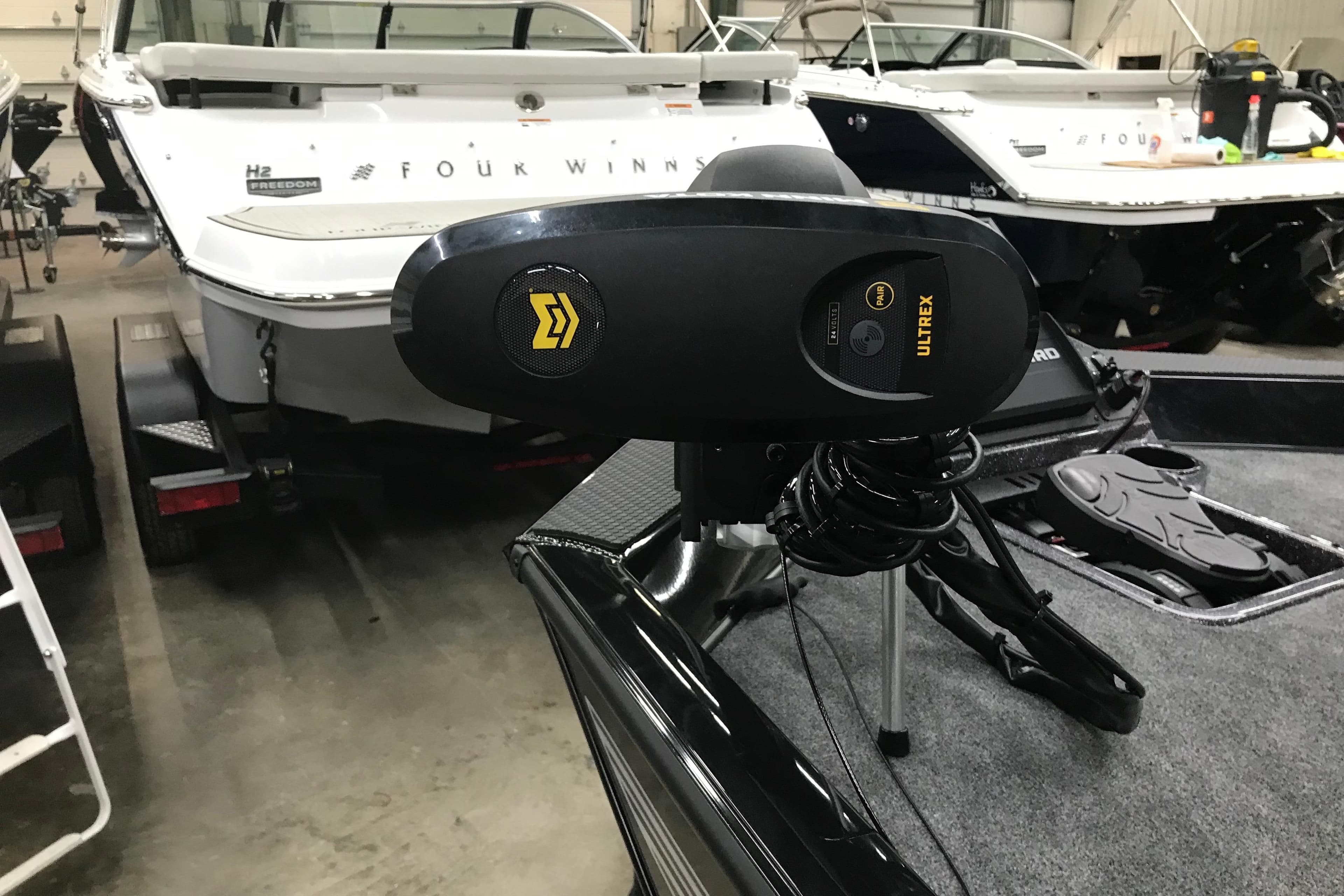 2026 Ranger RT188P boat with Ultrex trolling motor in a showroom.
