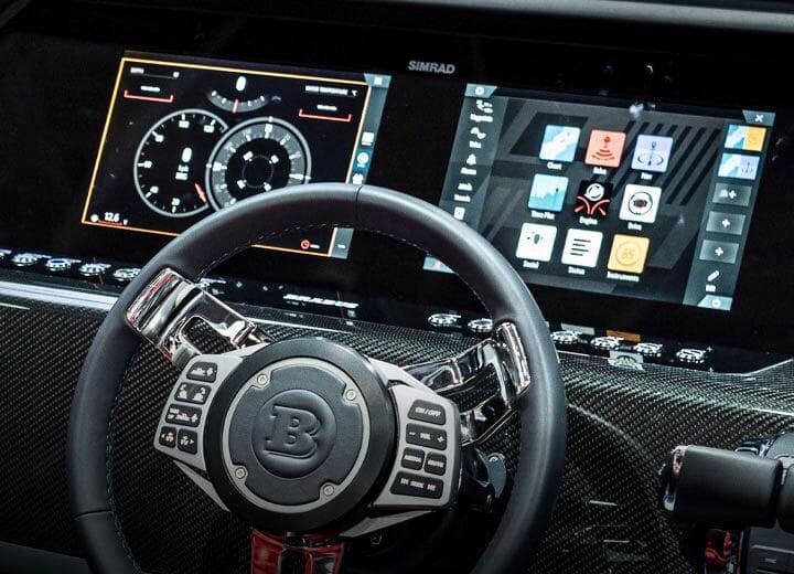 Steering wheel and dashboard of 2022 Axopar Brabus Shadow 900 ST boat.