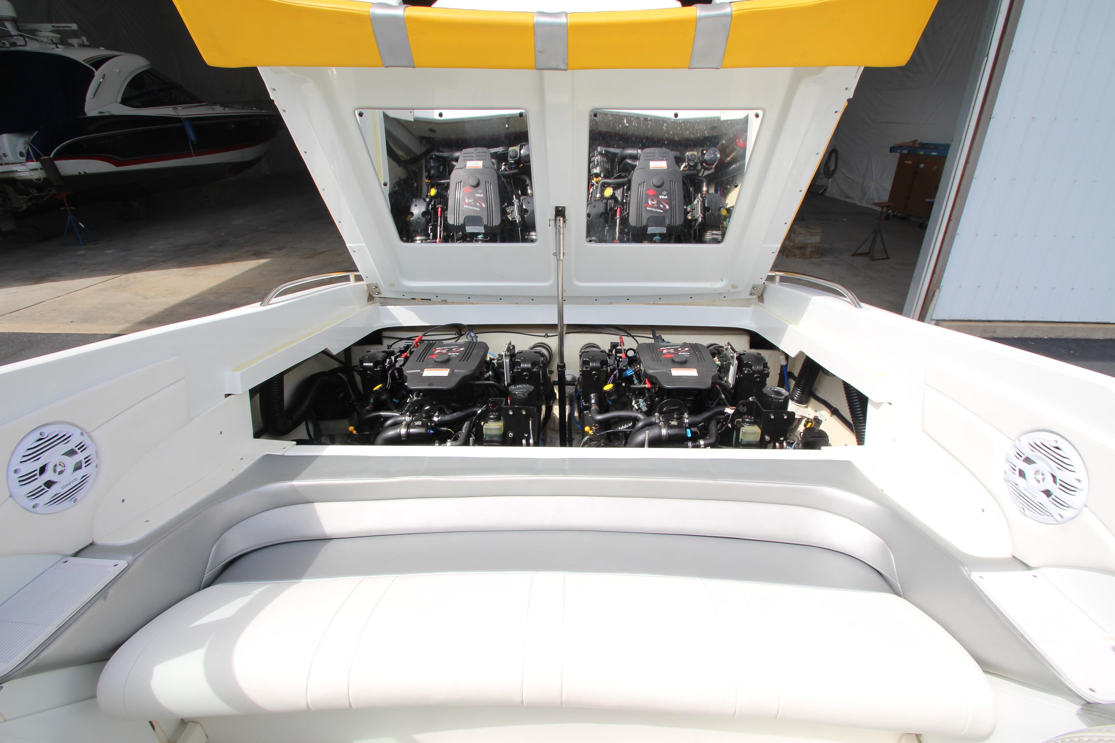 2008 Formula 292 FASTech boat engine compartment with dual engines and open hatch.