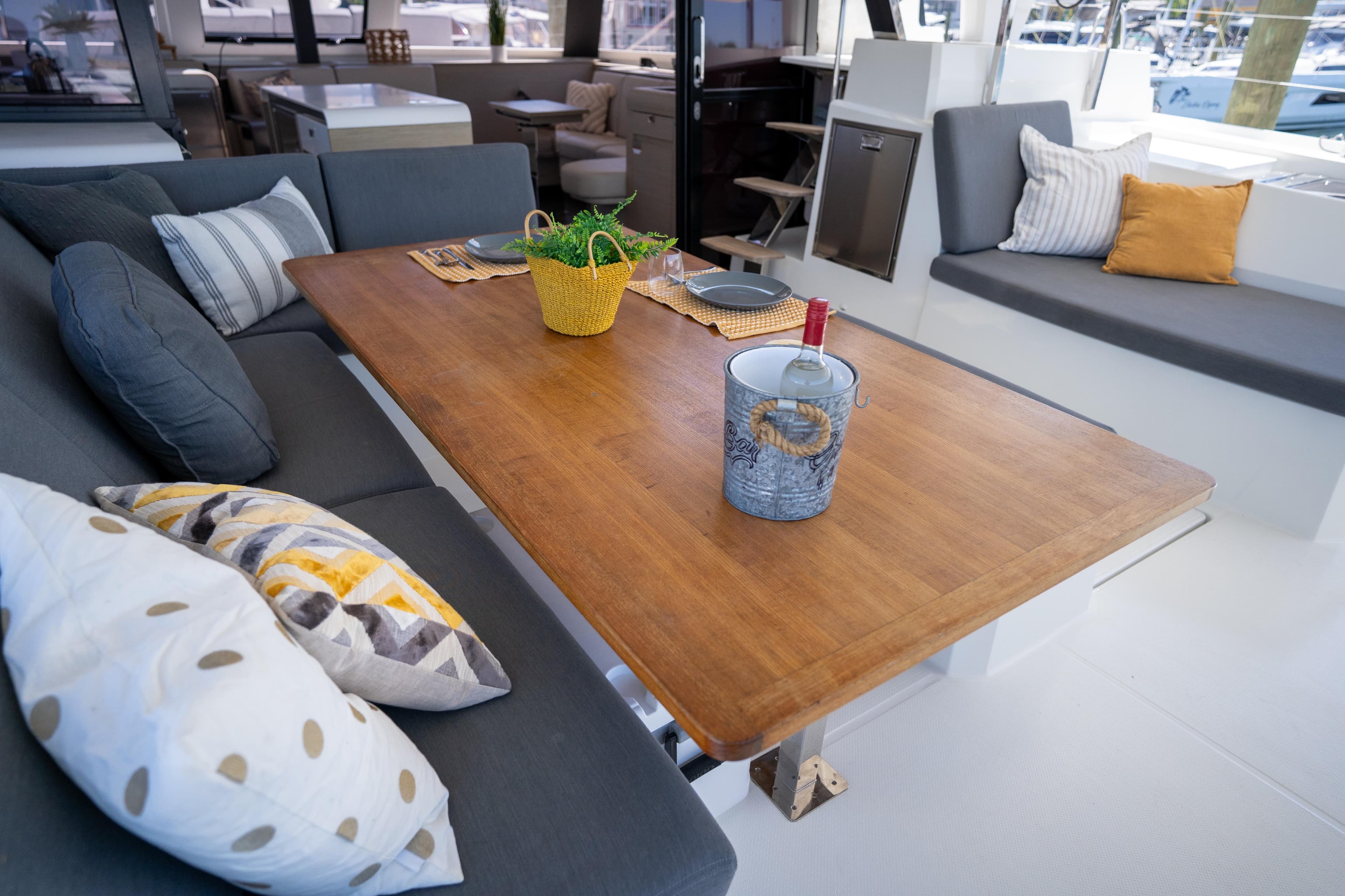 Luxurious interior of 2022 Fountaine Pajot Aura 51 Catamaran with elegant seating and decor.
