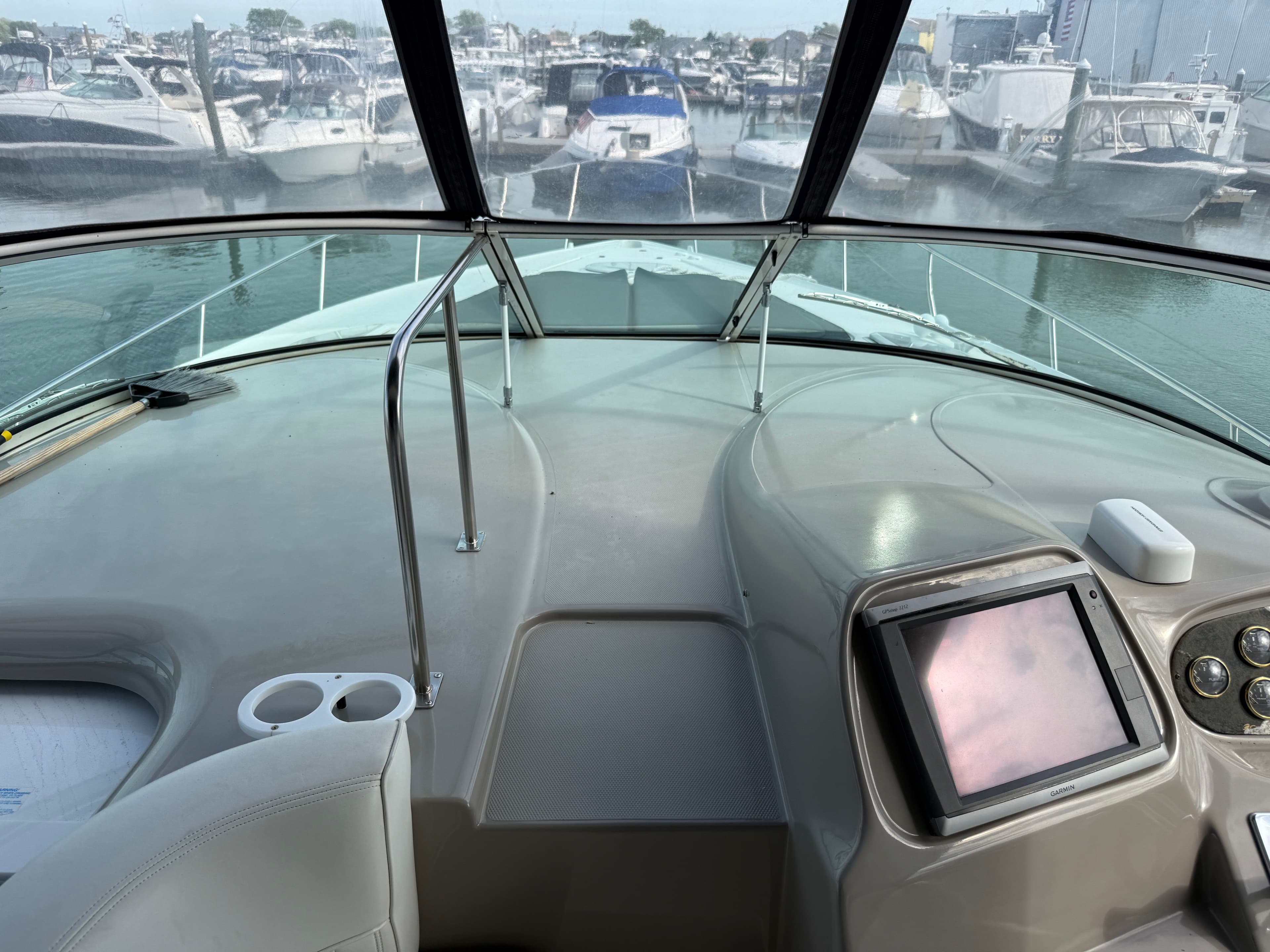 Interior view of 2003 Cruisers Yachts 3772 Express in marina.