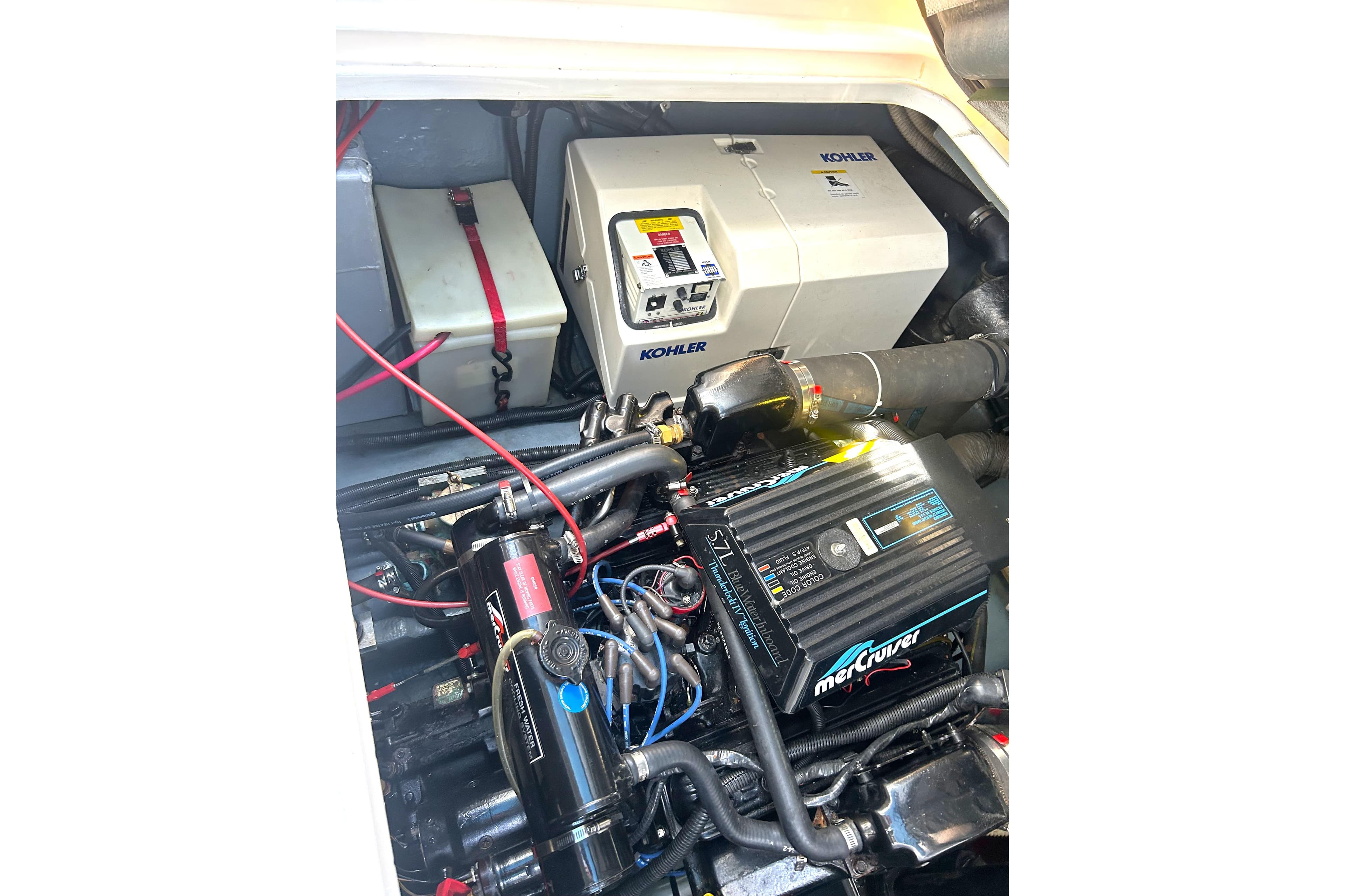 Engine compartment of a 1996 Sea Ray Sundancer 330 with Kohler generator and MerCruiser engine.