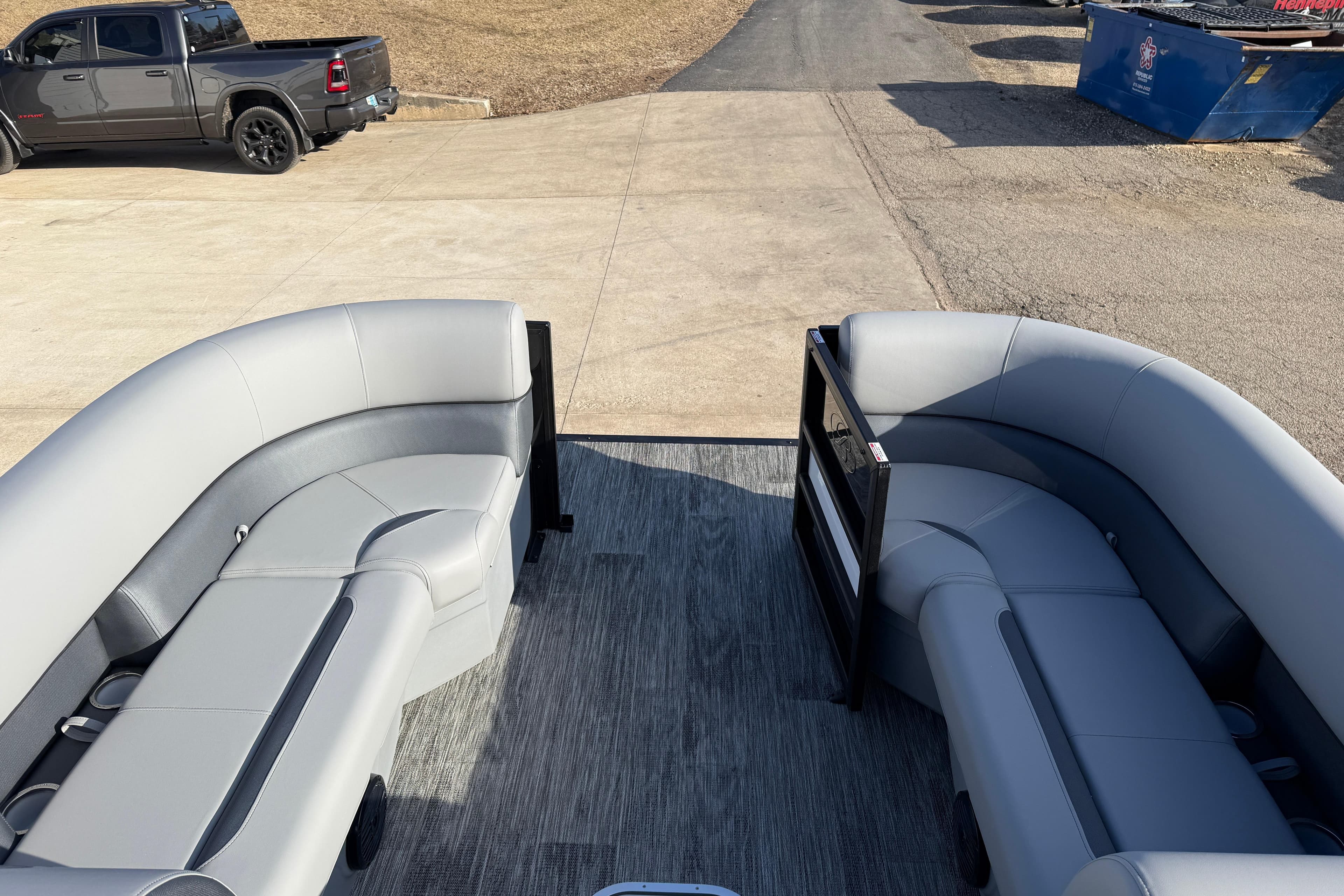 2026 Bentley Pontoons Legacy 243 Navigator interior with gray seating and open deck view.