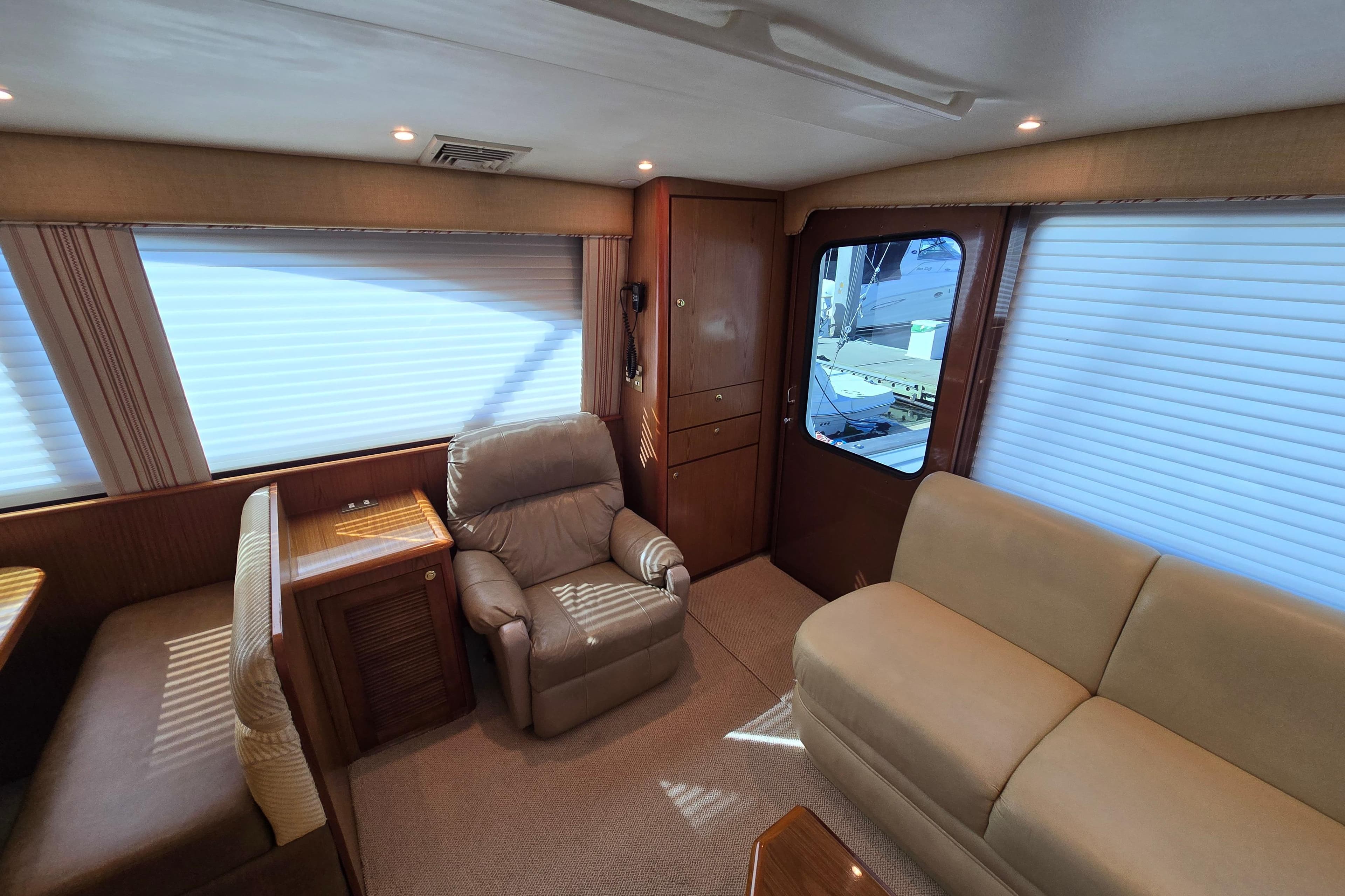 Luxurious interior of 2007 Ocean Yachts 46 Super Sport with plush seating and elegant design.