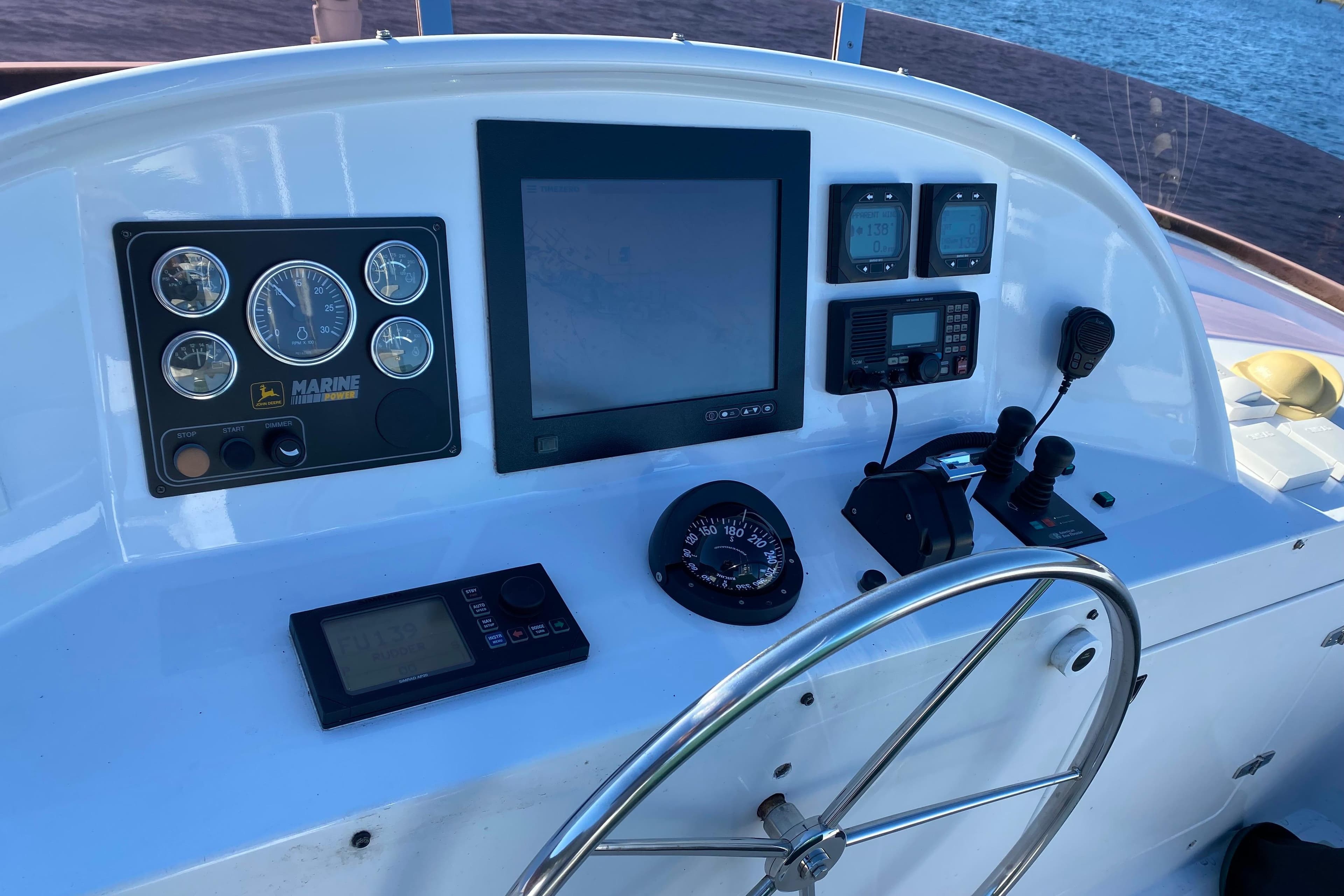 Control panel of 2003 Northern Marine 57 Raised Pilothouse yacht with navigation instruments.