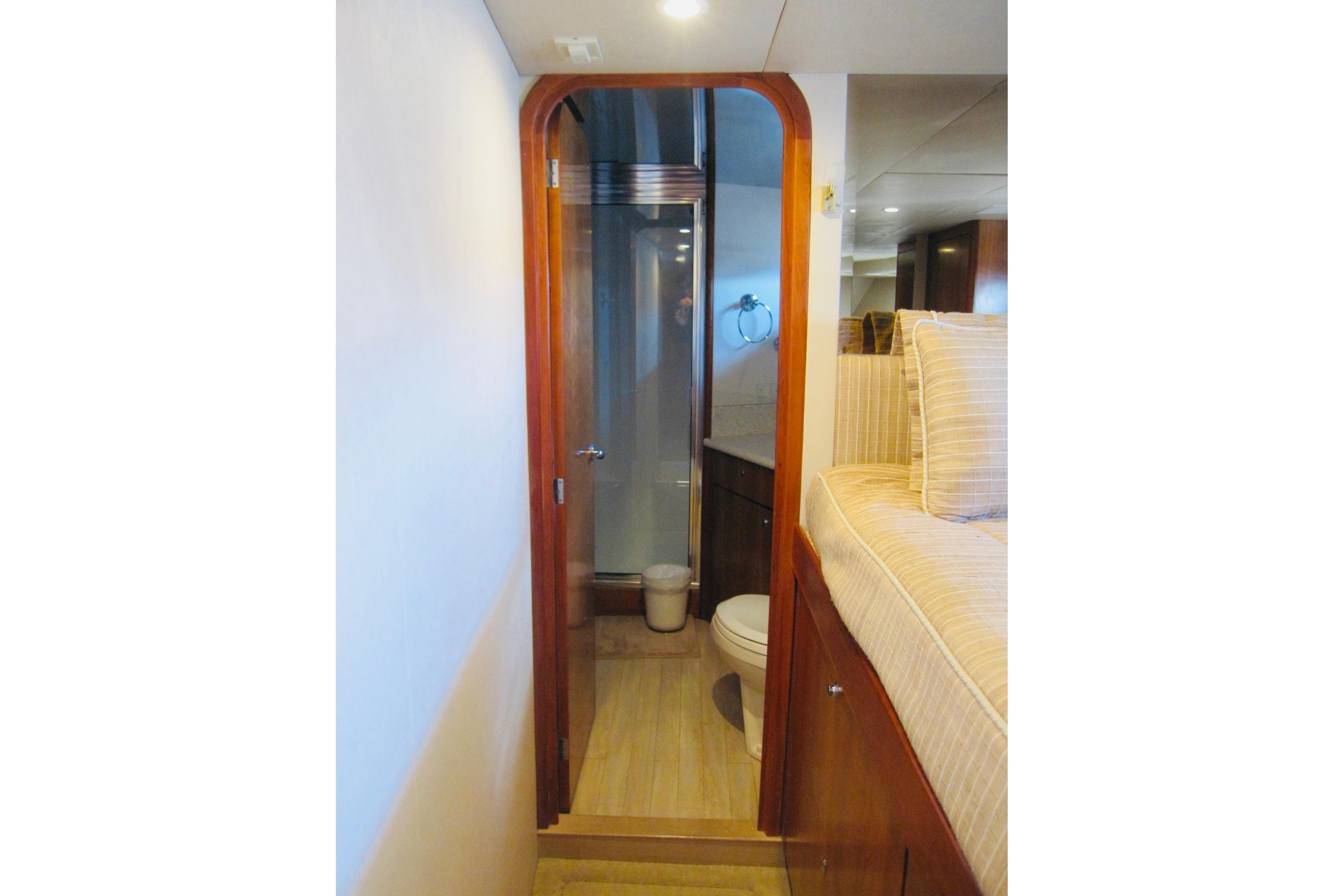 Interior of 1999 Delta Marine Raised Pilothouse Motoryacht with bathroom and cozy cabin.