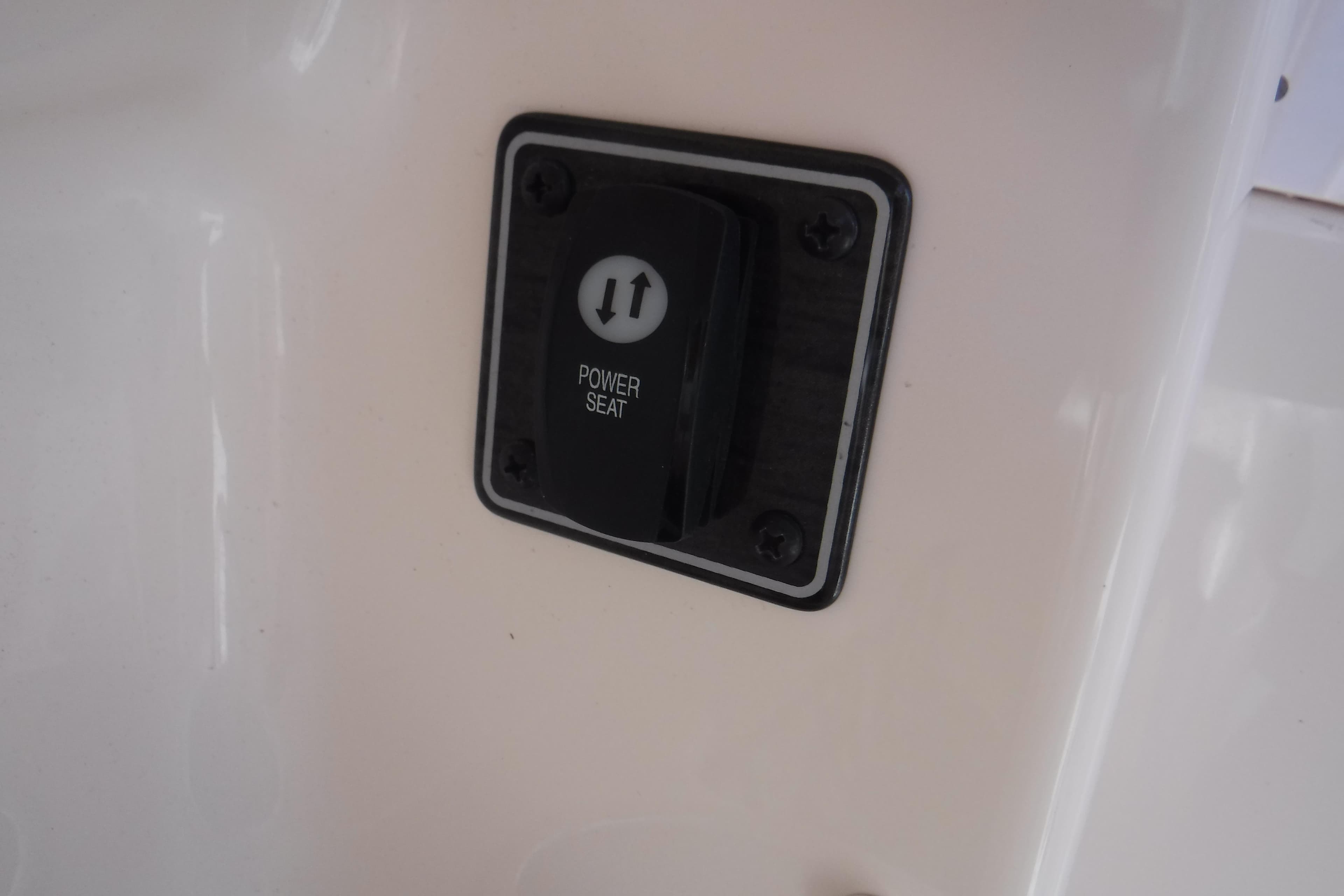 Power seat control switch on 2020 Grady-White Freedom 285 boat.