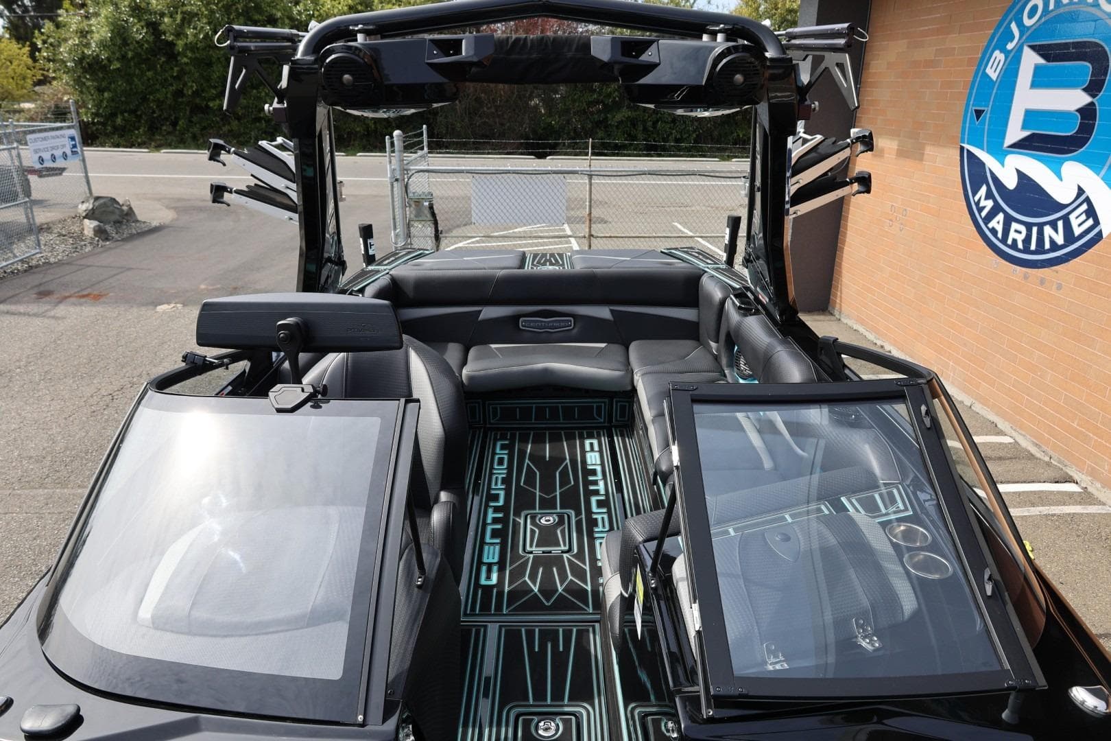 2021 Centurion Fi23 boat interior with sleek black seating and modern design elements.