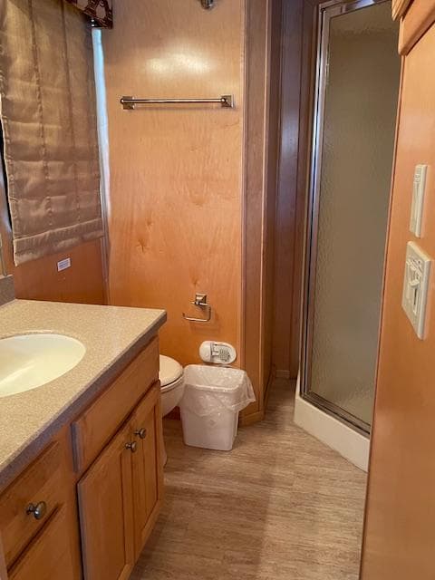 Houseboat bathroom with sink, toilet, and shower, American Waterways Sundancer Trip #17, 2007 model.