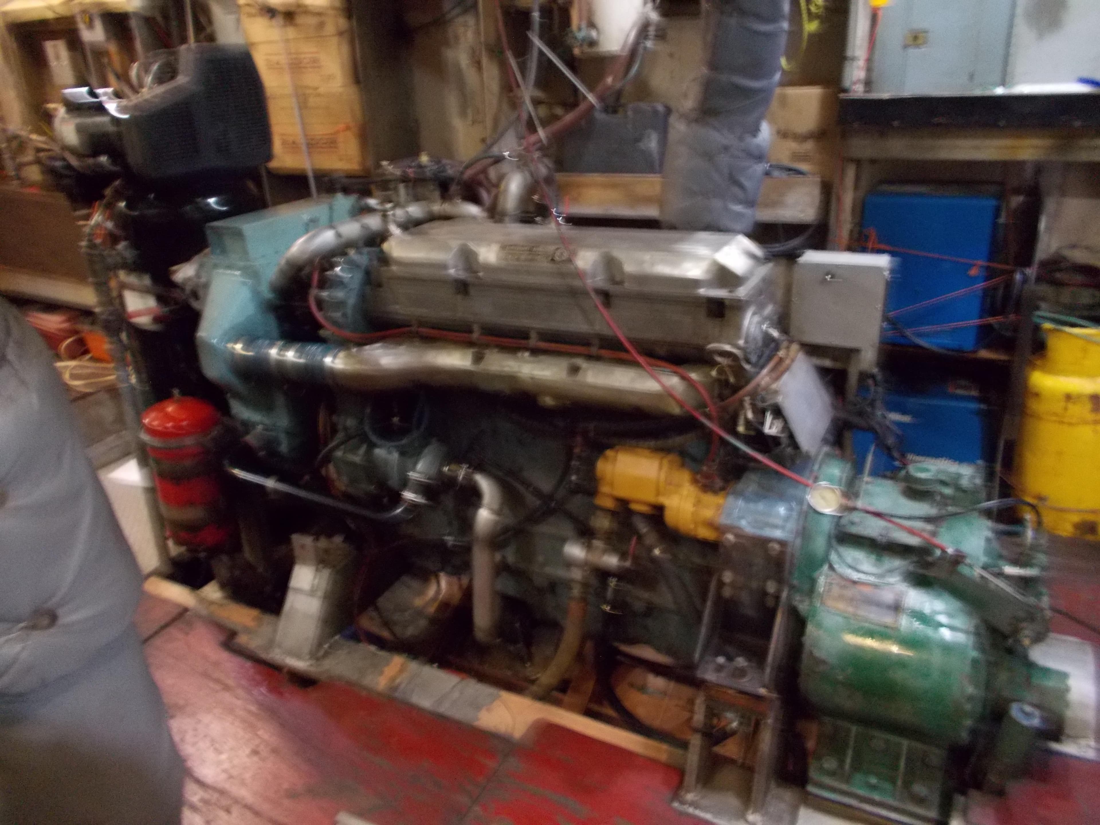 Engine room of 1979 Custom ALBACORE TROLLER with visible machinery and equipment.