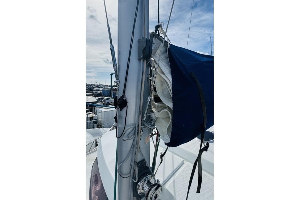 2010 Fountaine Pajot Mahe sailboat mast with rigging and sail cover.