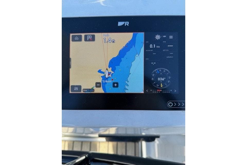 Navigation display on 2023 Beneteau Oceanis 34.1 showing nautical chart and compass.