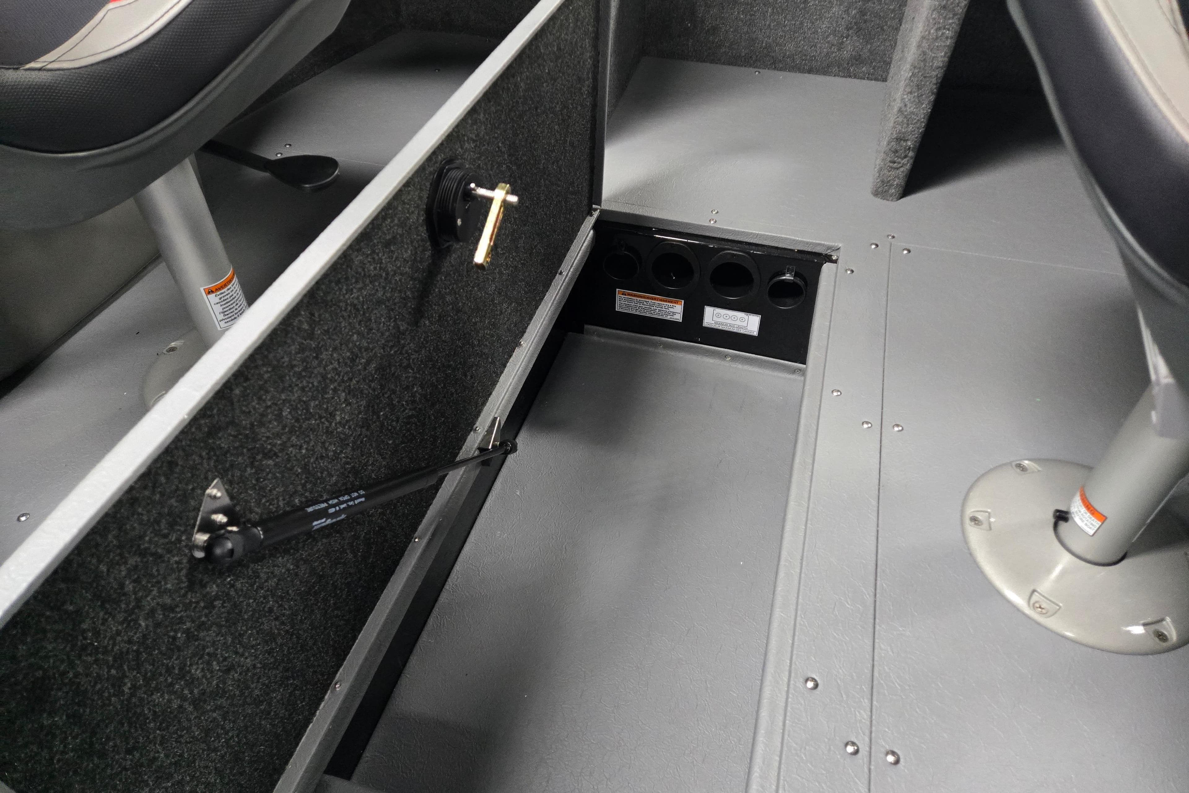 2026 Princecraft Sport 175 boat interior with open storage compartment and seating.