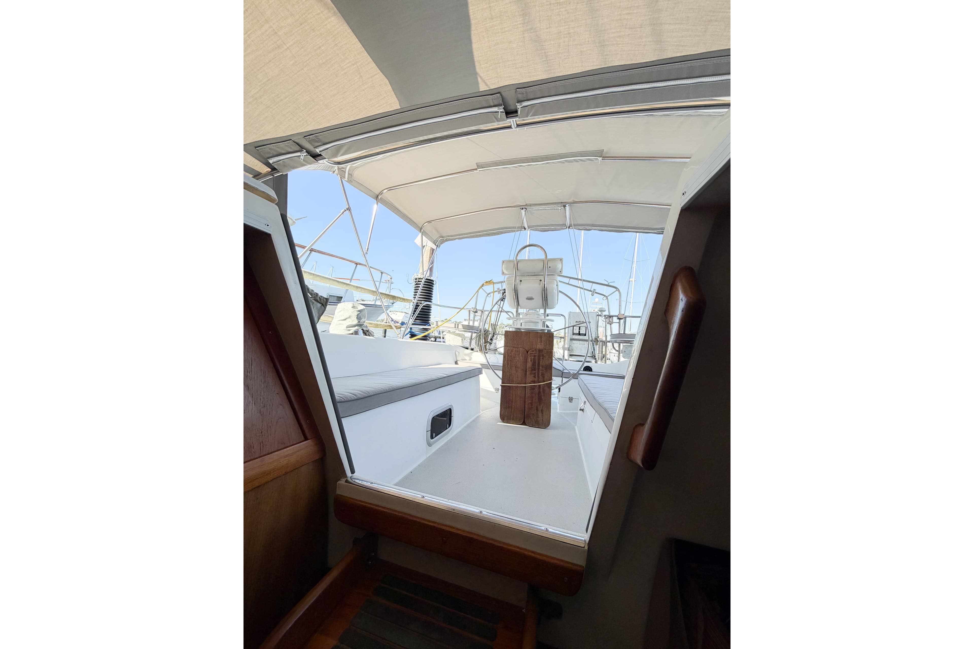 Interior view of a 1996 Catalina 36 MkII sailboat cockpit with canopy and seating.