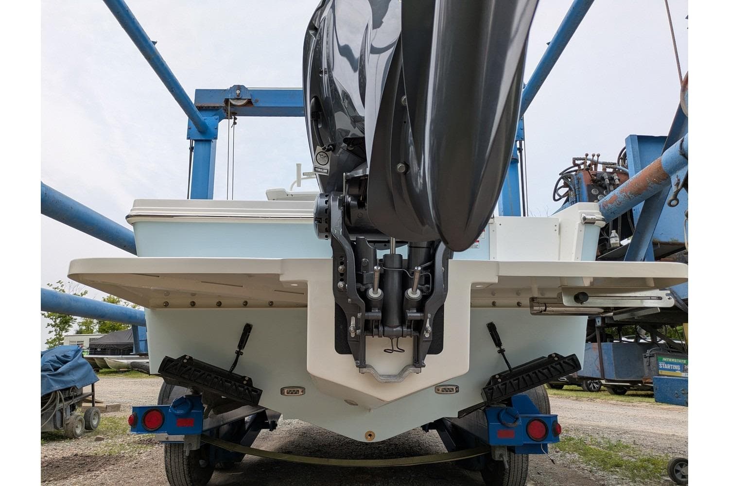 Rear view of a 2026 Parker 227 Explorer boat on a trailer.