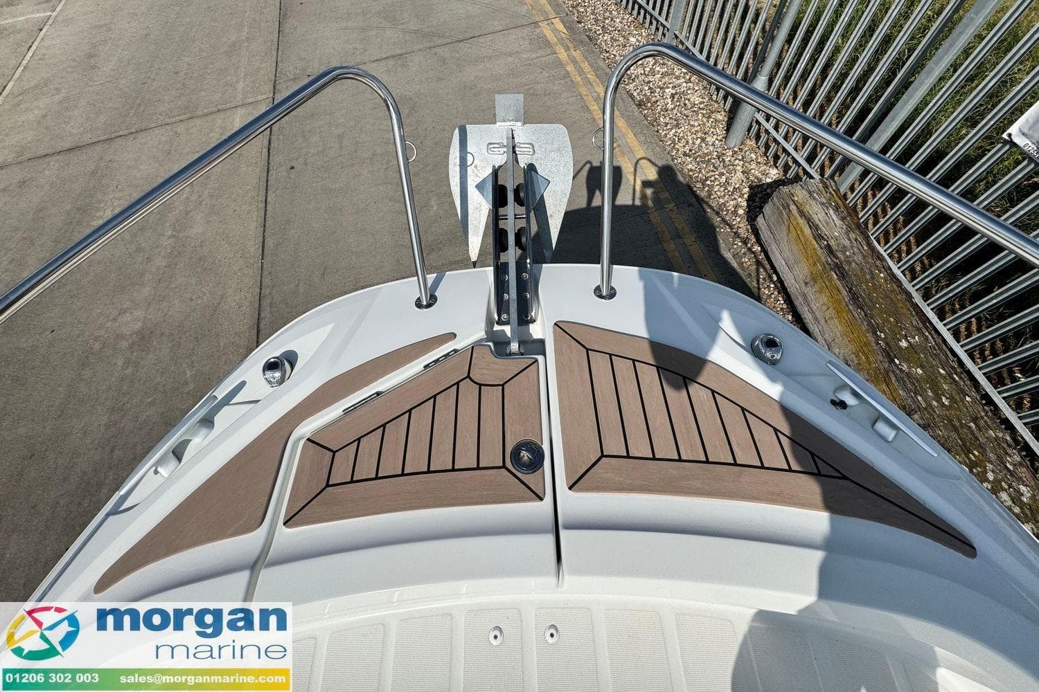 2023 Jeanneau Cap Camarat 7.5 WA Serie 3 boat deck with anchor and wood finish.