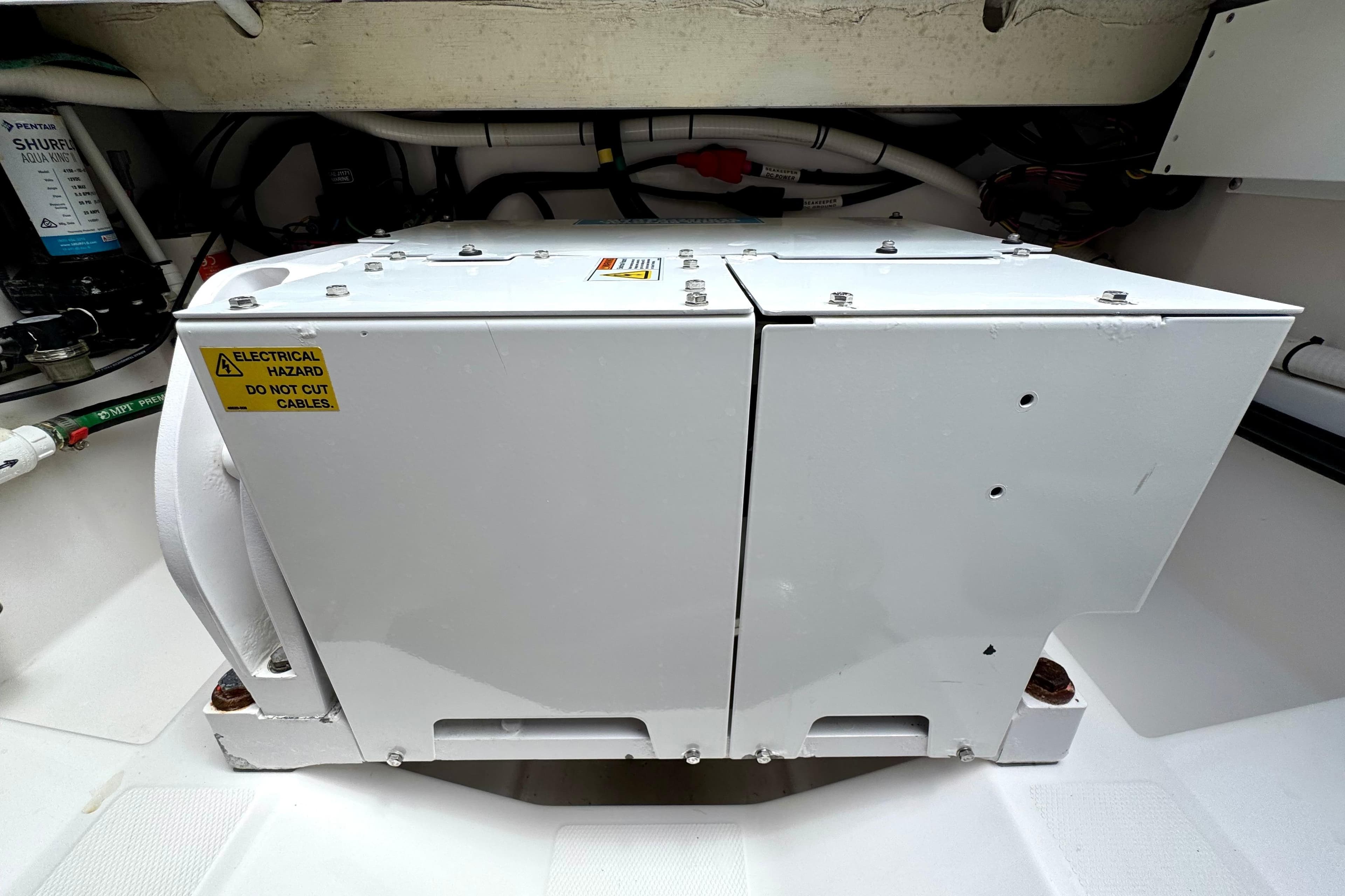 Electrical equipment in 2023 Everglades 395 Center Console boat, warning label visible.