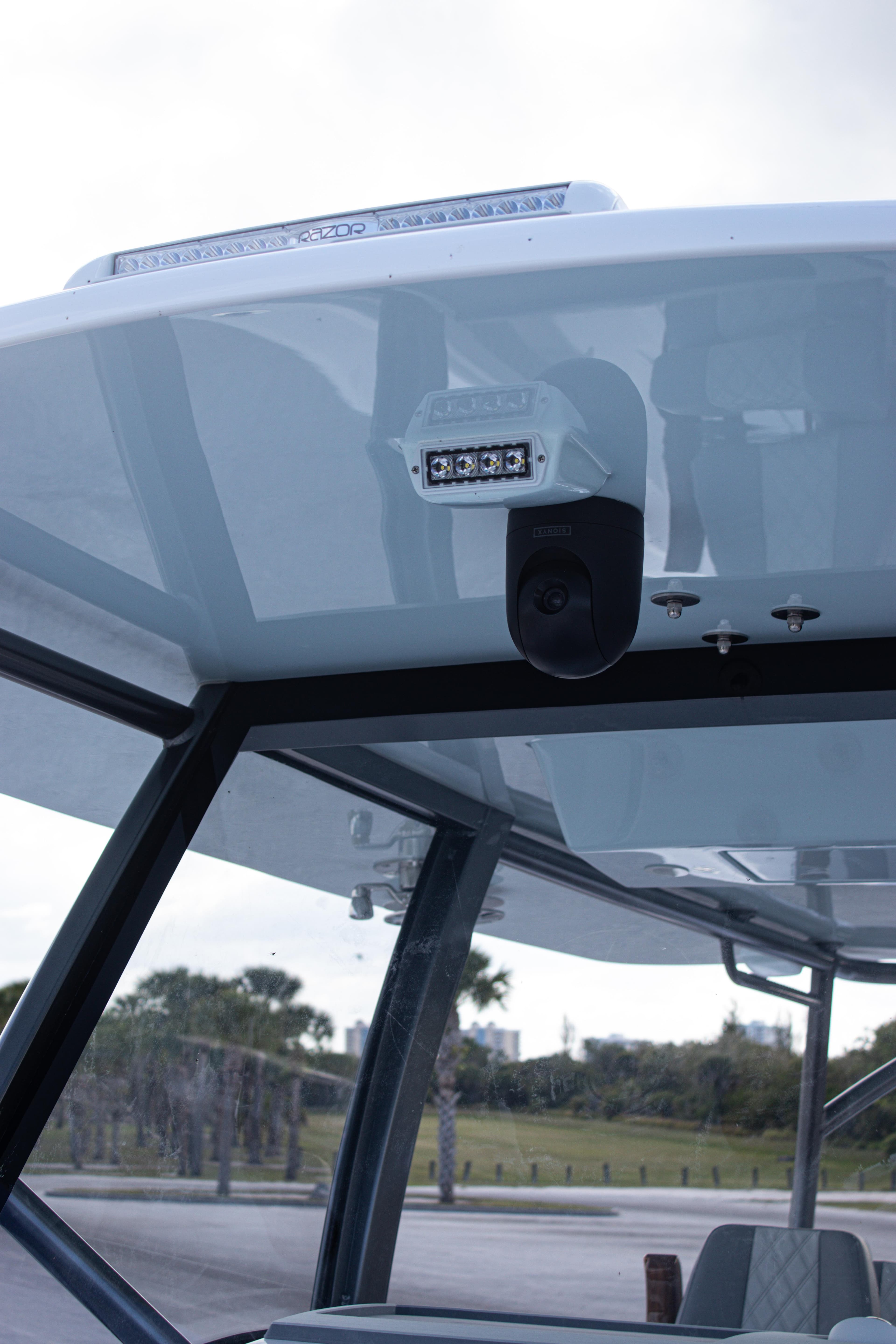 2026 Front Runner 43 Catamaran roof with mounted light and speaker system.