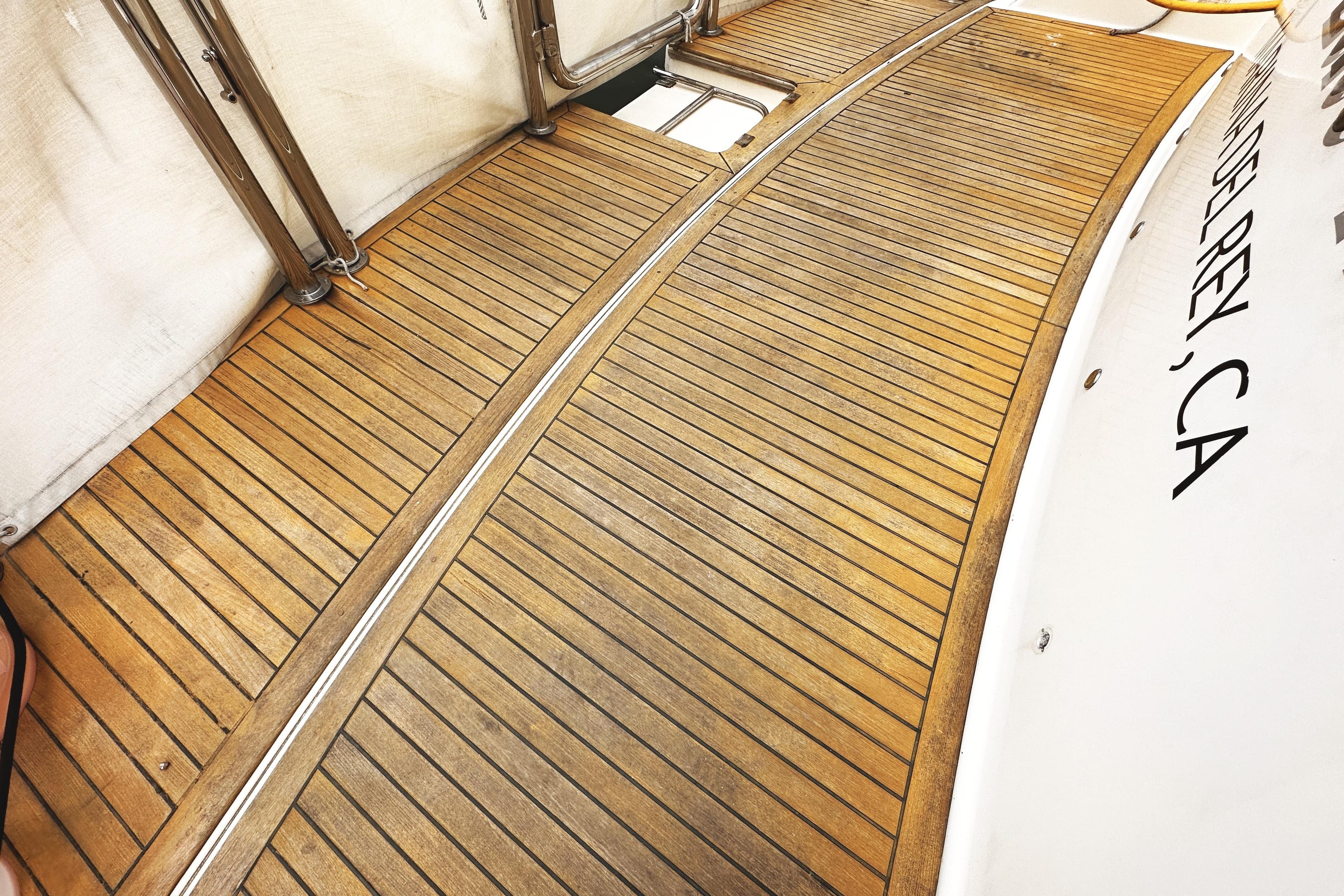 Teak deck of 2004 McKinna 57 PHMY Widebody yacht, Marina del Rey, CA.