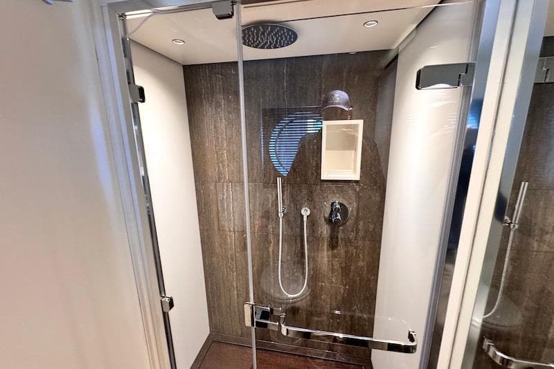 Luxurious shower in 2026 Azimut Grande Magellano 25 Metri yacht bathroom.
