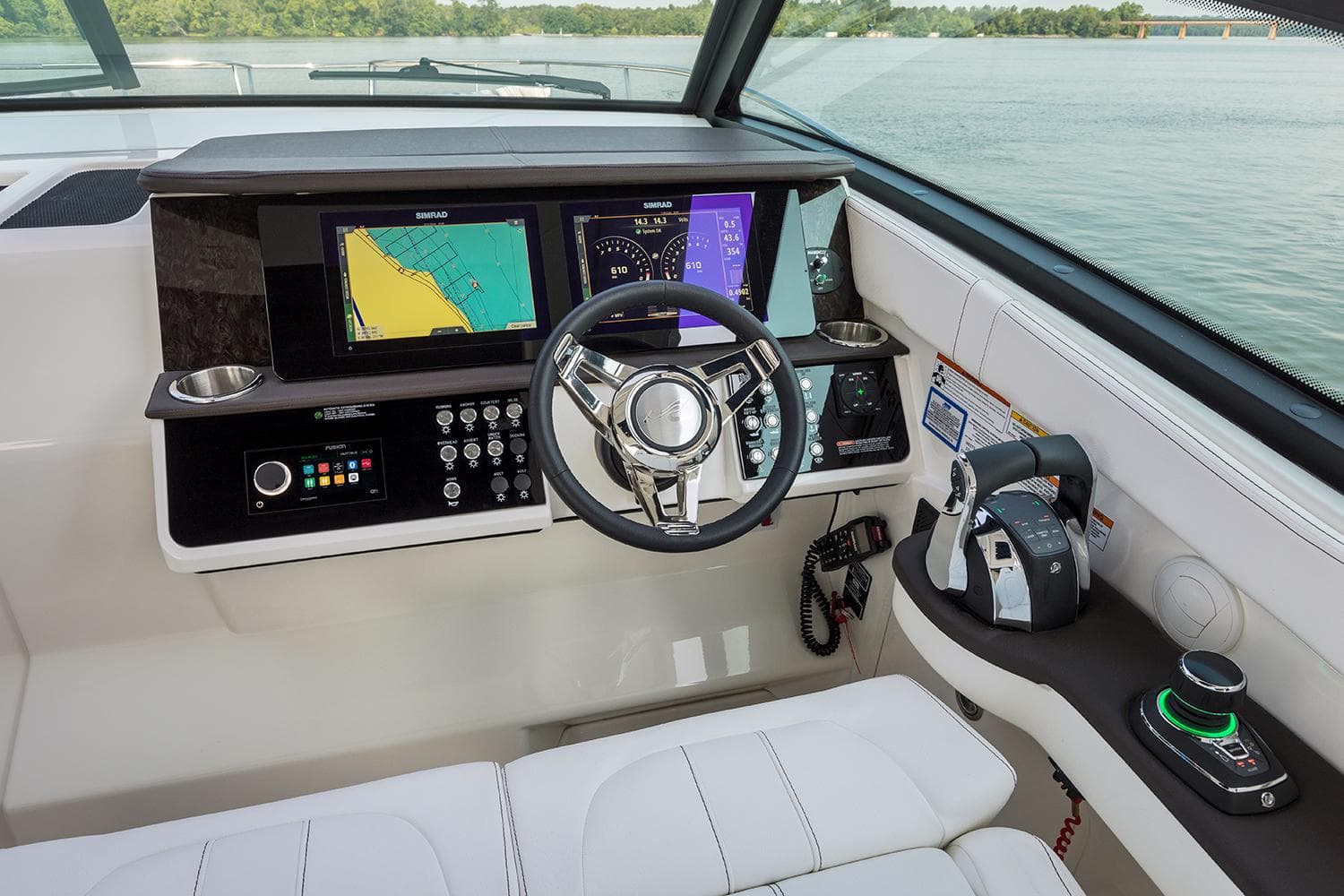 Manufacturer Provided Image: 2025 Sea Ray Sundancer 320 helm with advanced navigation displays and controls.