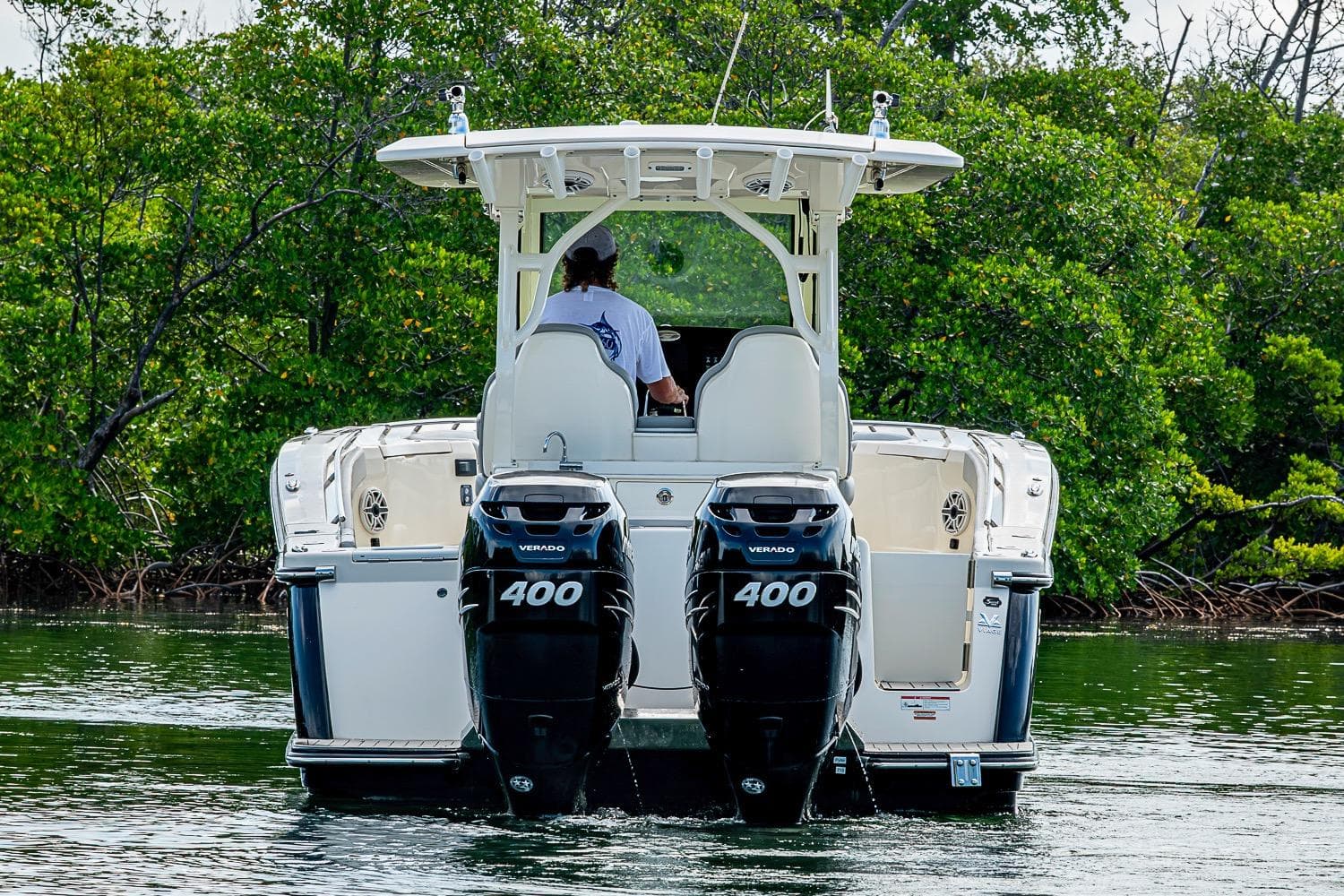 2021 Scout 330 LXF boat with dual 400 Verado engines on water.