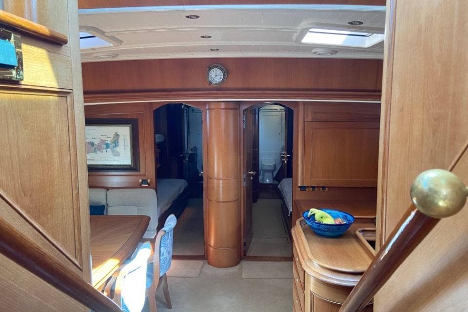 Luxurious wooden interior of 2002 Holland Jachtbouw Classic Hoek 82 yacht cabin.