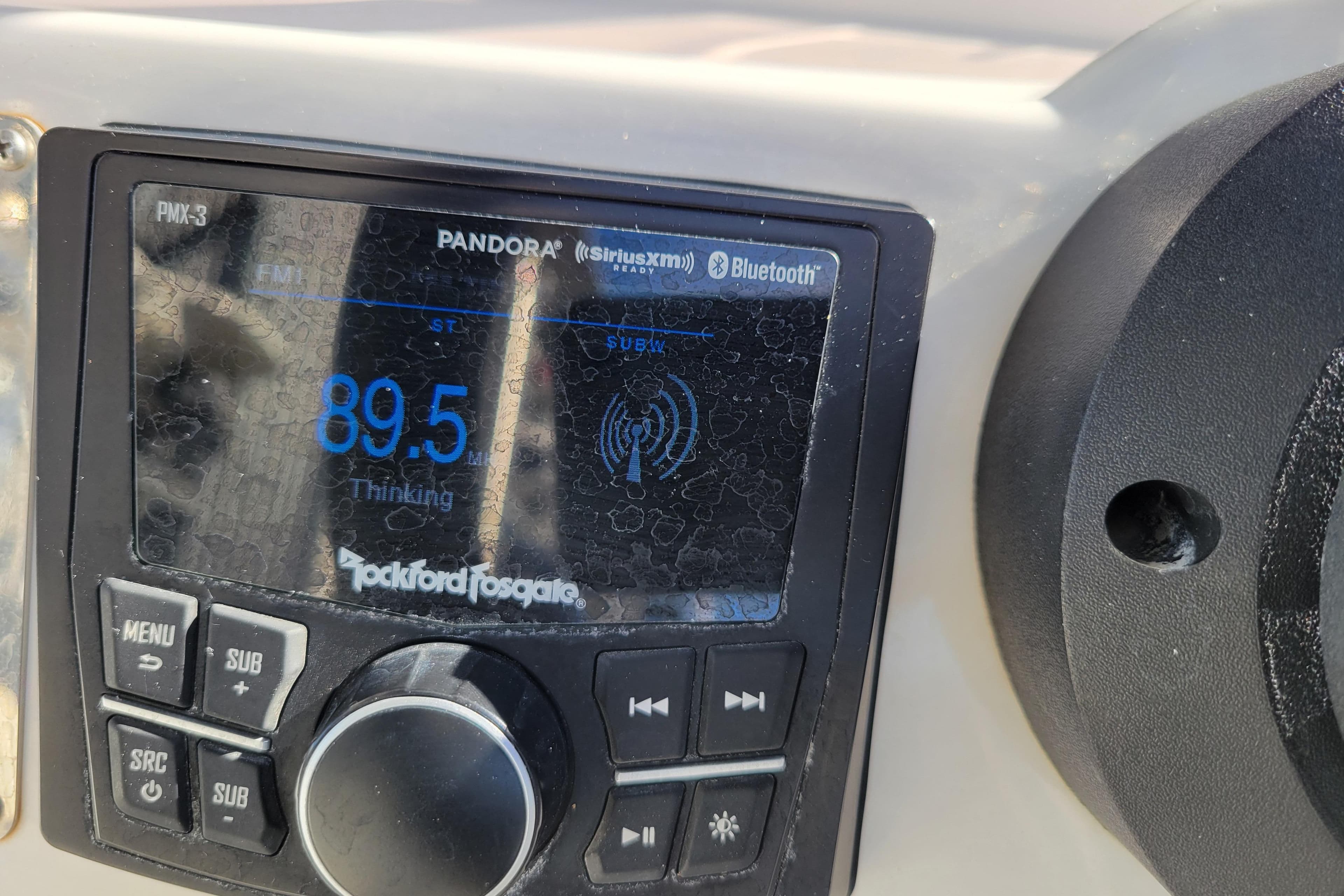 Close-up of Rockford Fosgate stereo on 2022 Highfield Sport 460 boat, displaying FM 89.5.