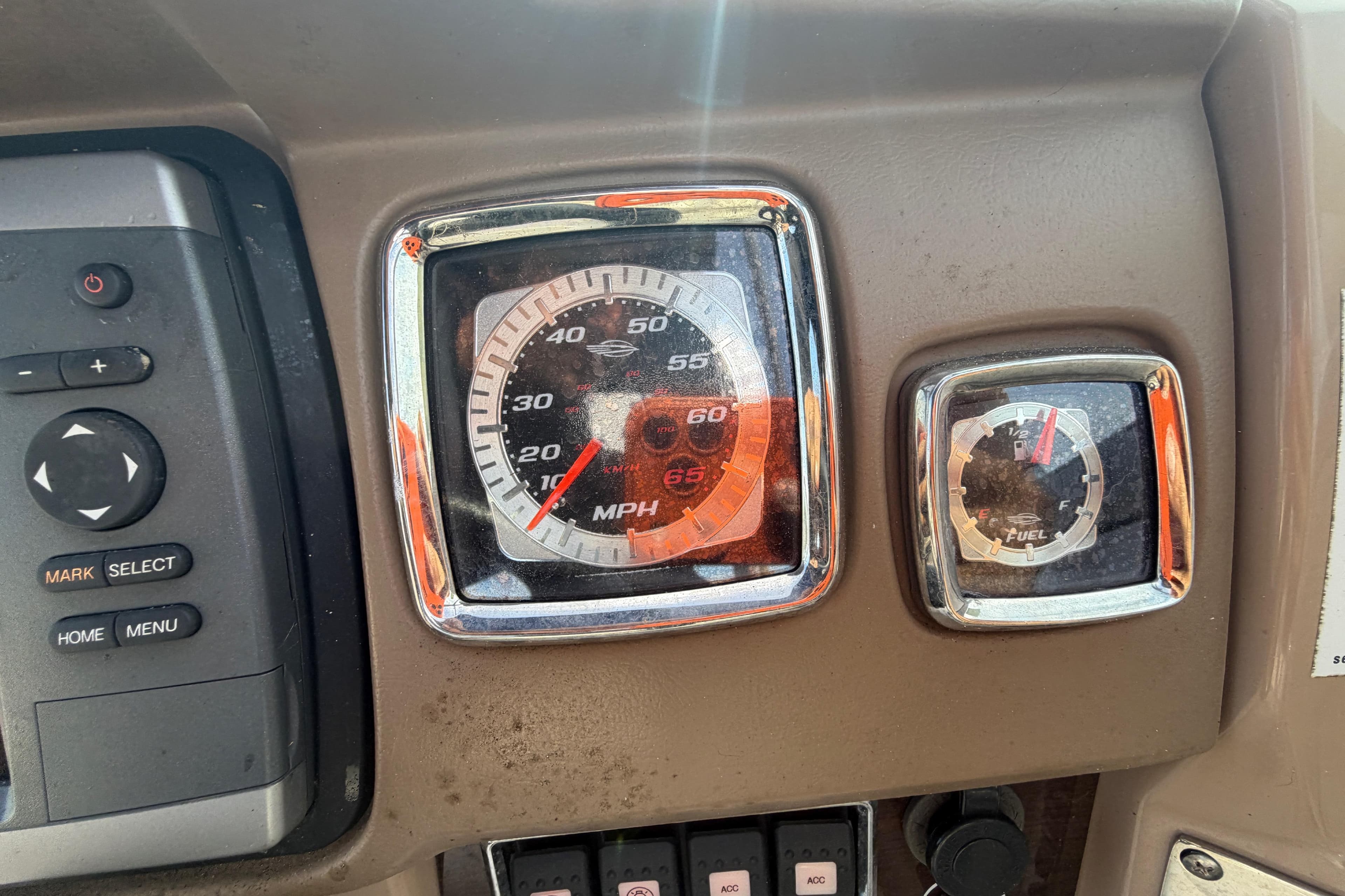 Dashboard of 2014 Chaparral 225 SSi with speedometer and fuel gauge.