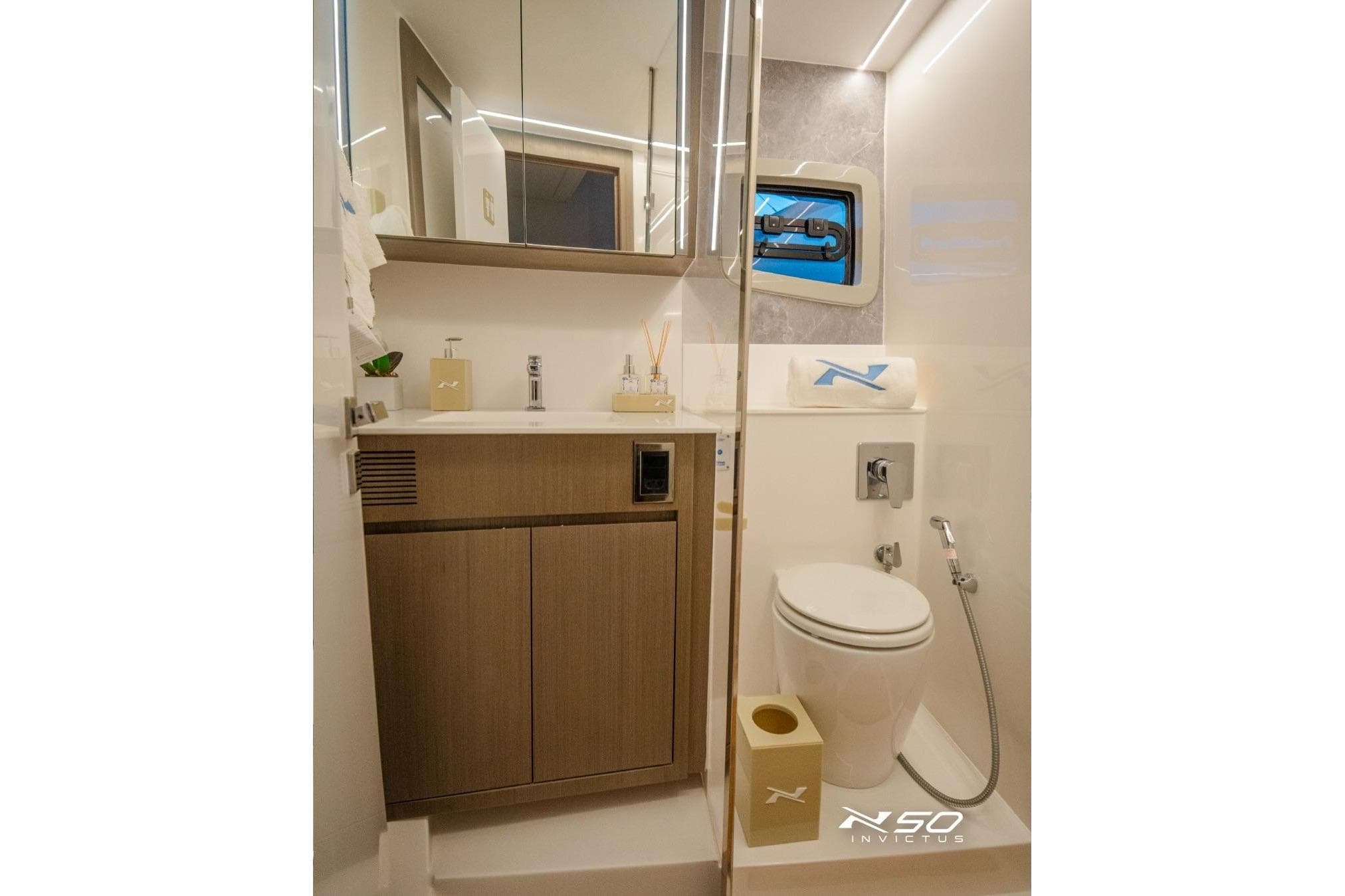 Luxurious bathroom interior of 2025 NX Boats NX50 Invictus HT yacht, featuring modern amenities.