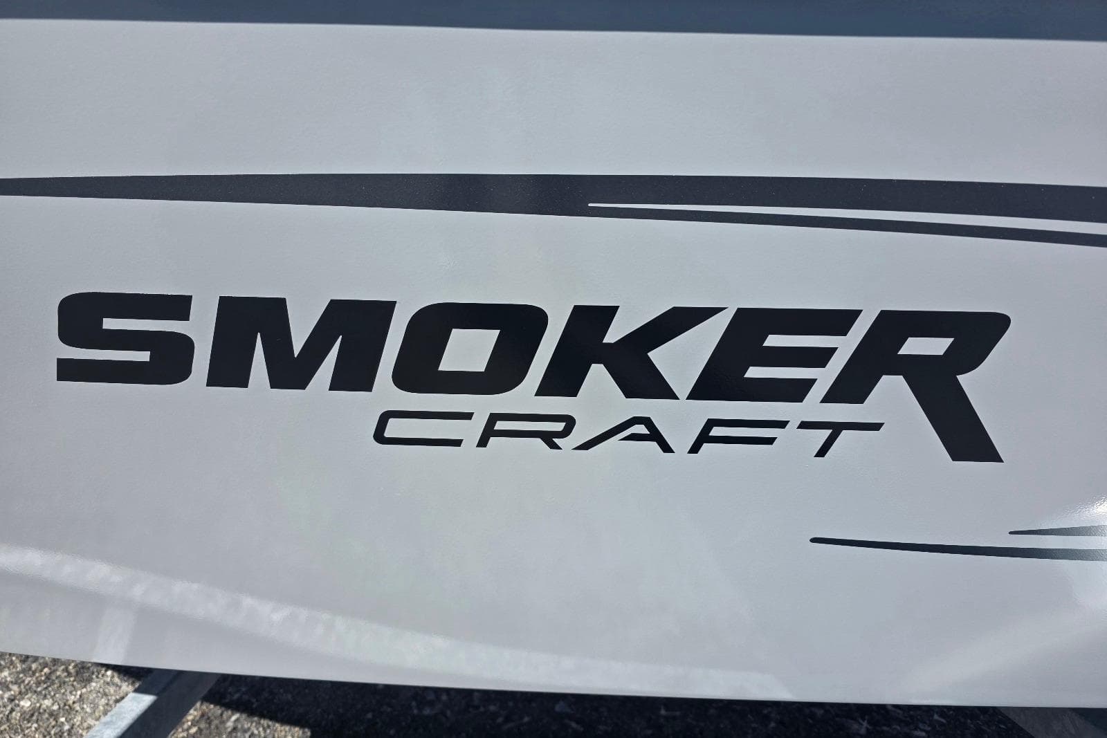 Smoker Craft Freedom 160 TL 2026 logo on boat exterior.