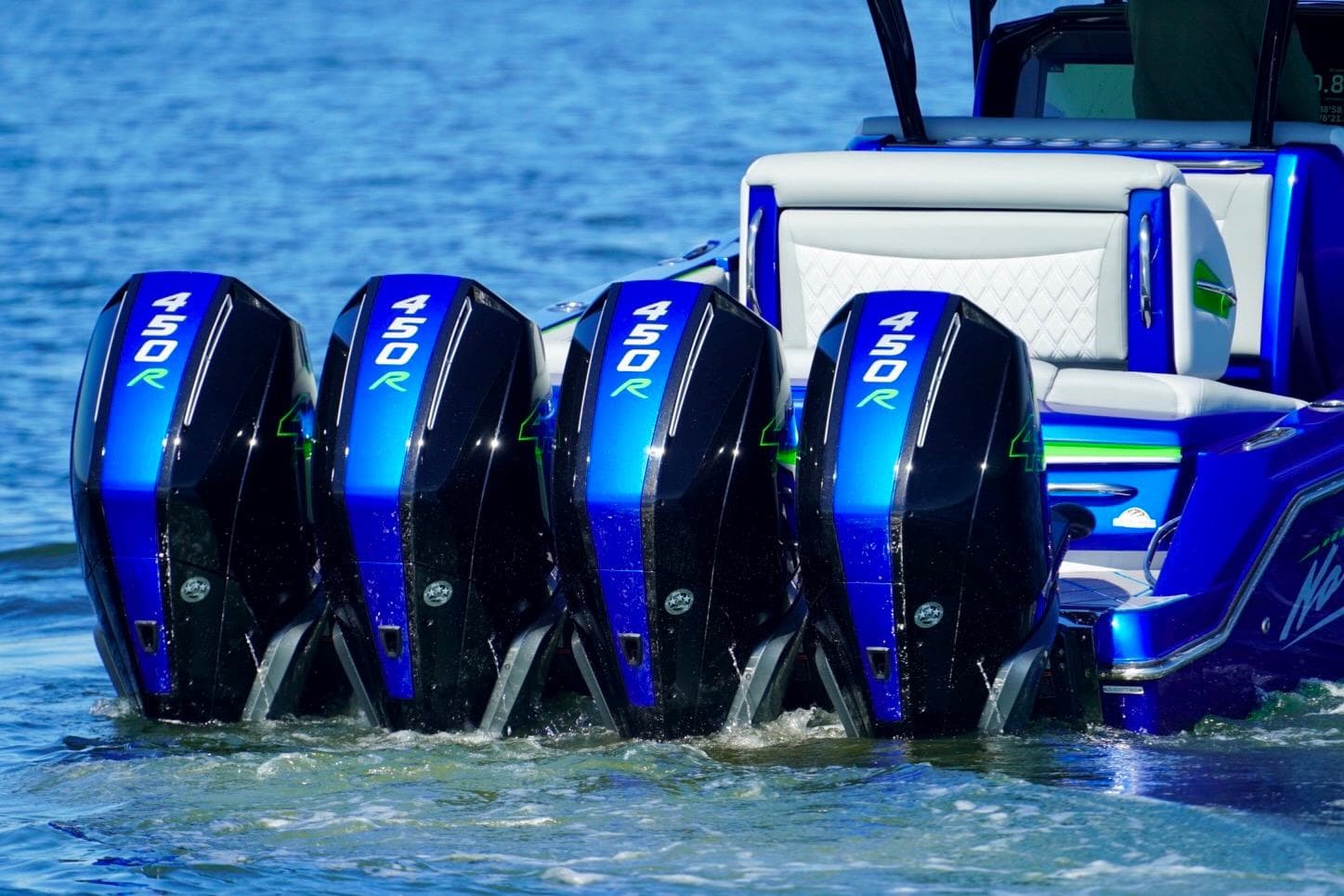 2023 Nor-Tech 390 Sport Center Console with four powerful 450R engines on water.