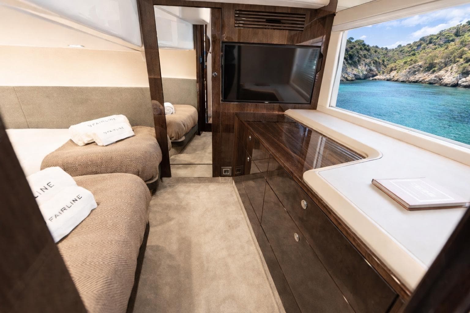 Luxurious interior of 2026 Fairline Targa 40 yacht with scenic ocean view.