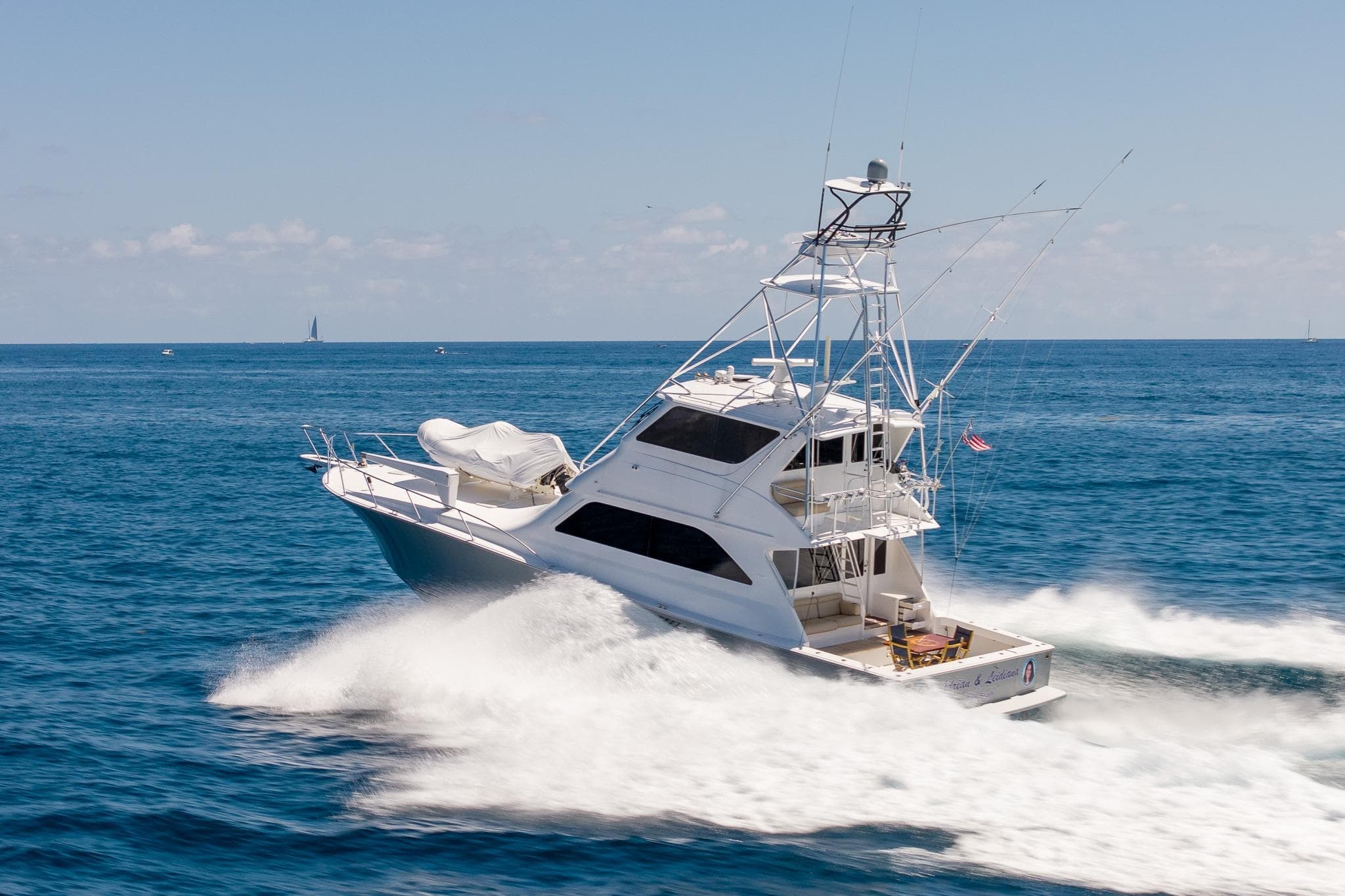 2005 Viking 61 Enclosed Bridge yacht cruising on open ocean waters.