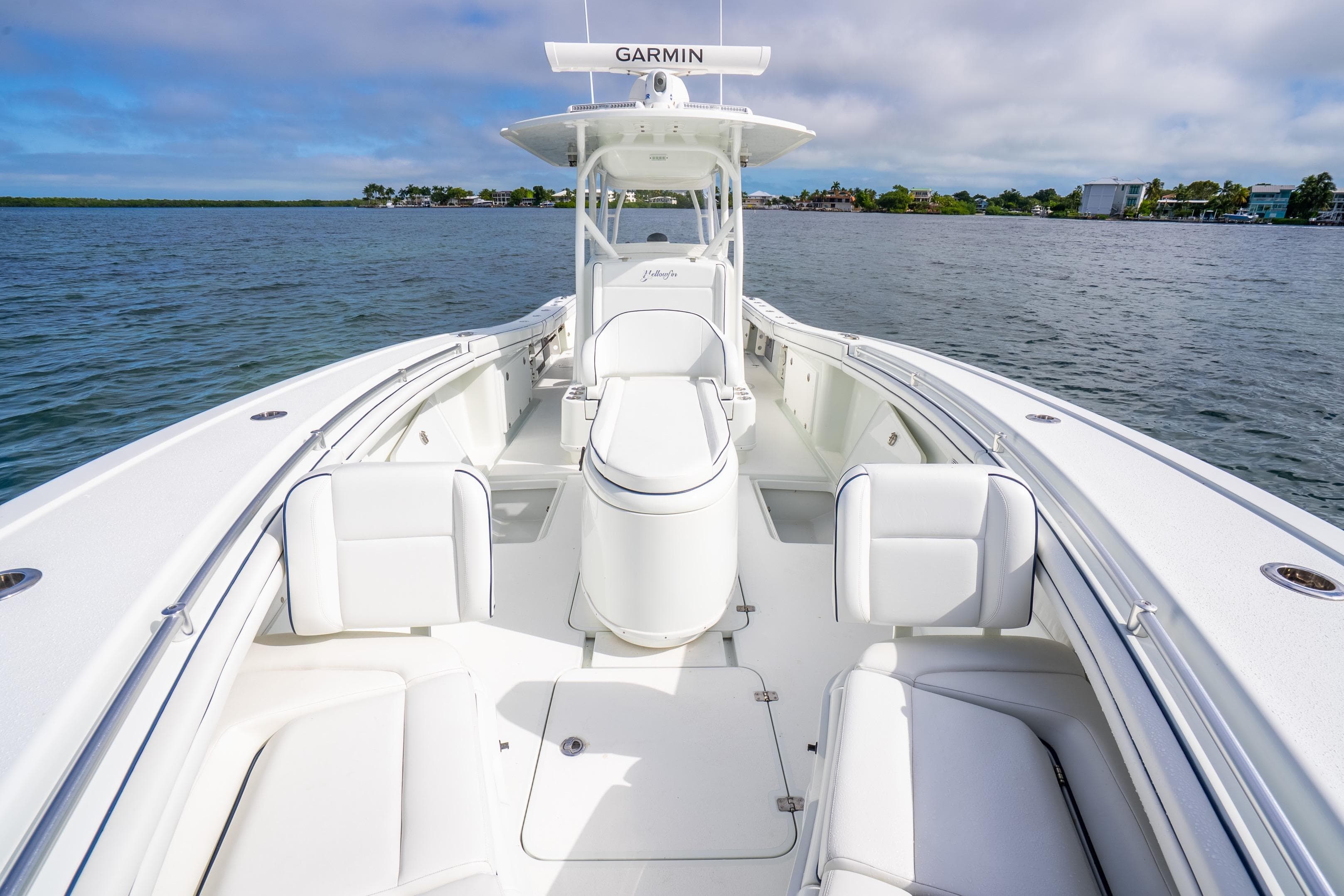 2016 Yellowfin 36 Offshore boat with spacious deck and seating on calm water.