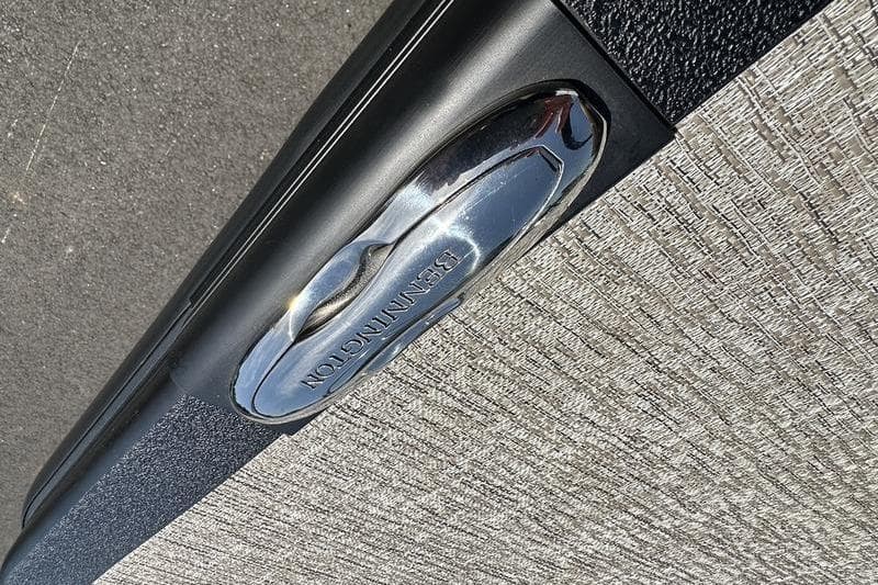 Close-up of 2026 Bennington M Swingback 22 MSB boat detail with chrome accent.