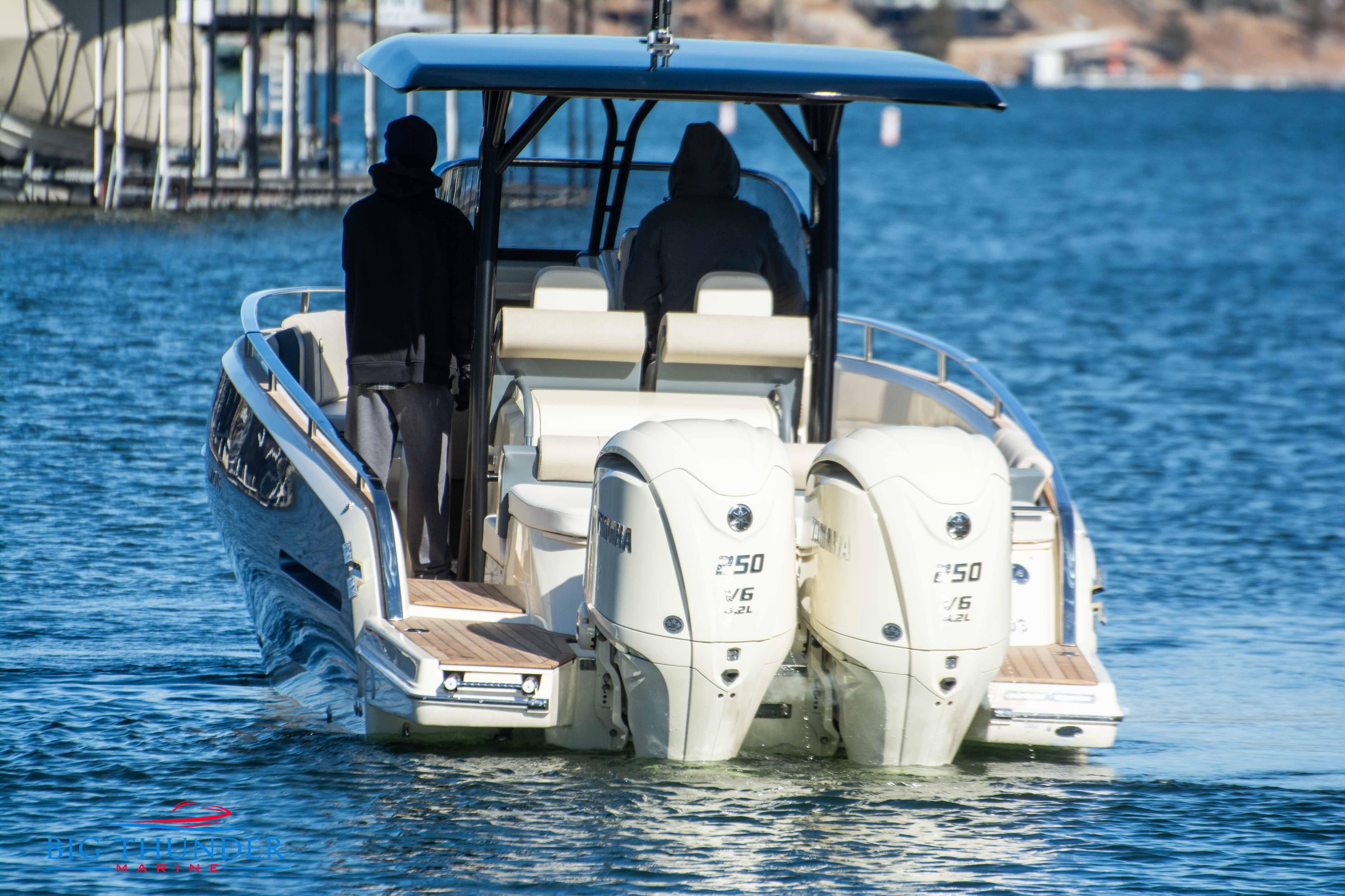 2024 Invictus TT280S boat with twin Yamaha 250 V6 engines on the water.