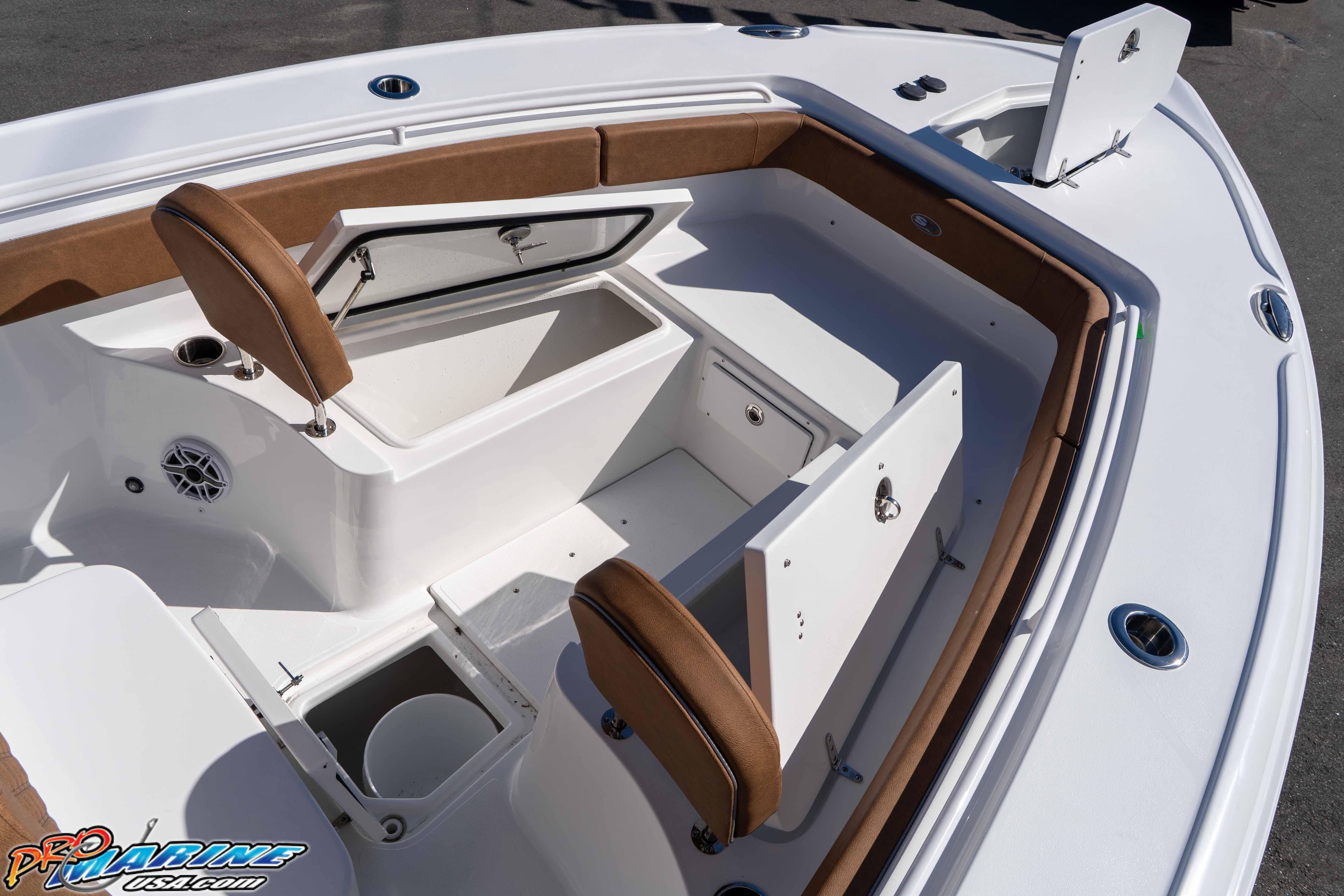 2026 Sea Hunt Ultra 275 SE boat interior with open storage compartments and seating.