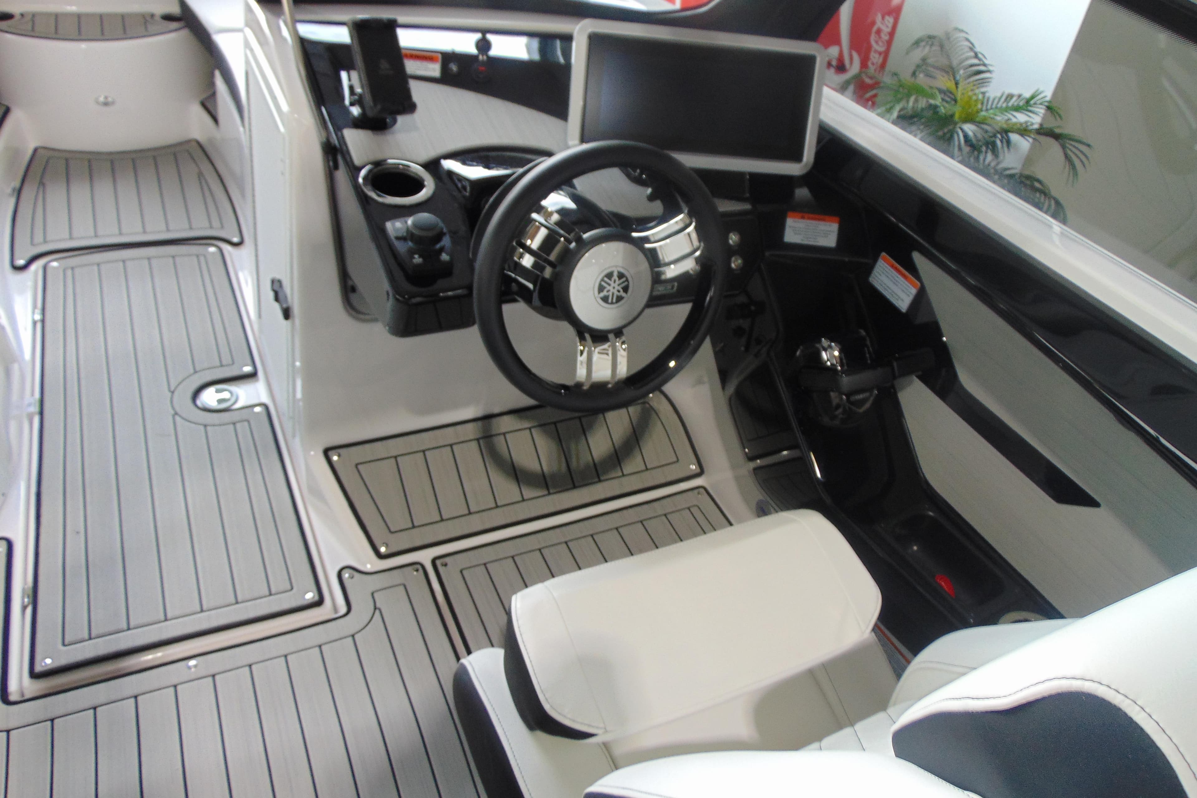 2026 Yamaha Boats 222SD cockpit with modern steering and control panel.
