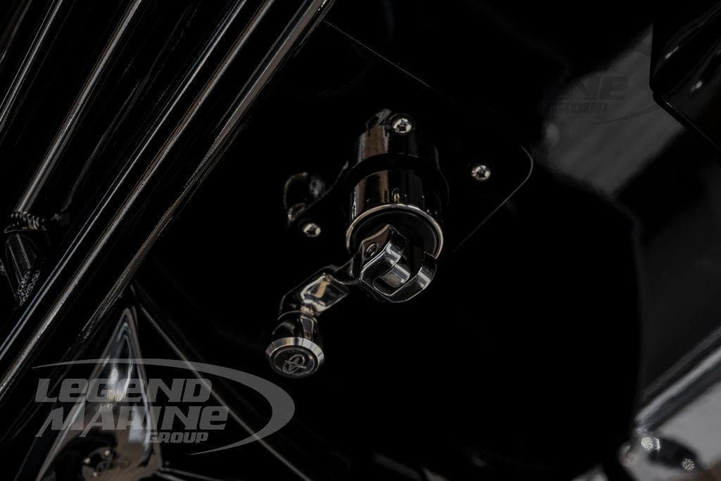 Close-up of 2024 Nor-Tech 392 Super Fish boat component, featuring sleek metallic details.