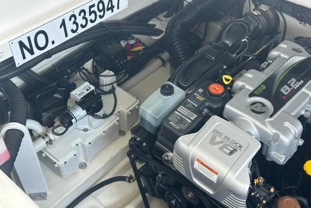 Engine compartment of 2023 Formula 350 Crossover Bowrider I/O with V8 engine components.