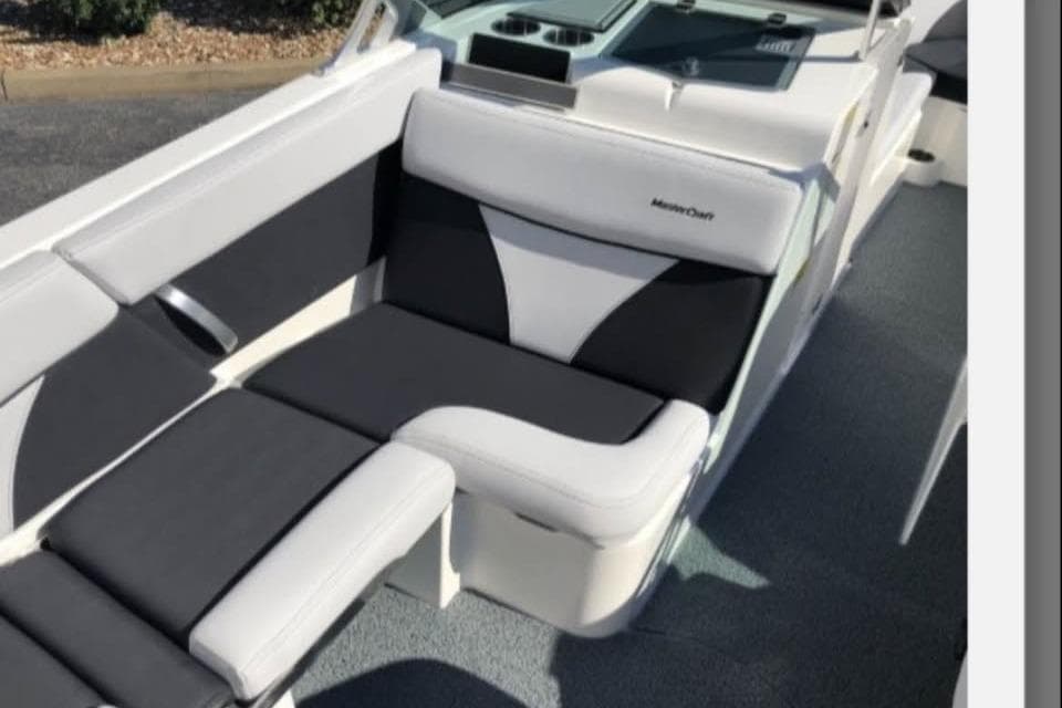 2019 MasterCraft XT25 boat interior with black and white seating.