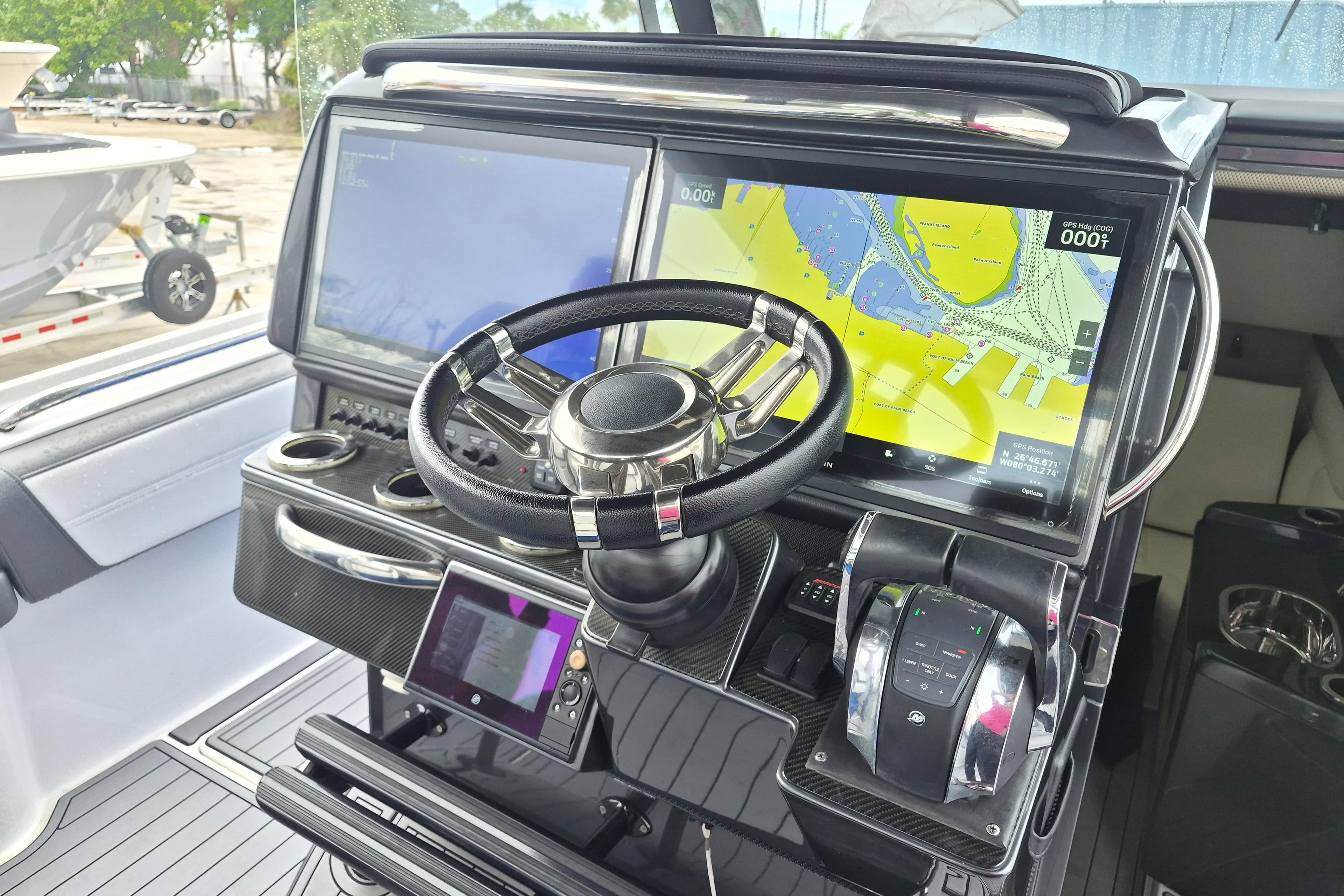 2020 Nor-Tech 450 Sport Center Console dashboard with navigation screens and steering wheel.