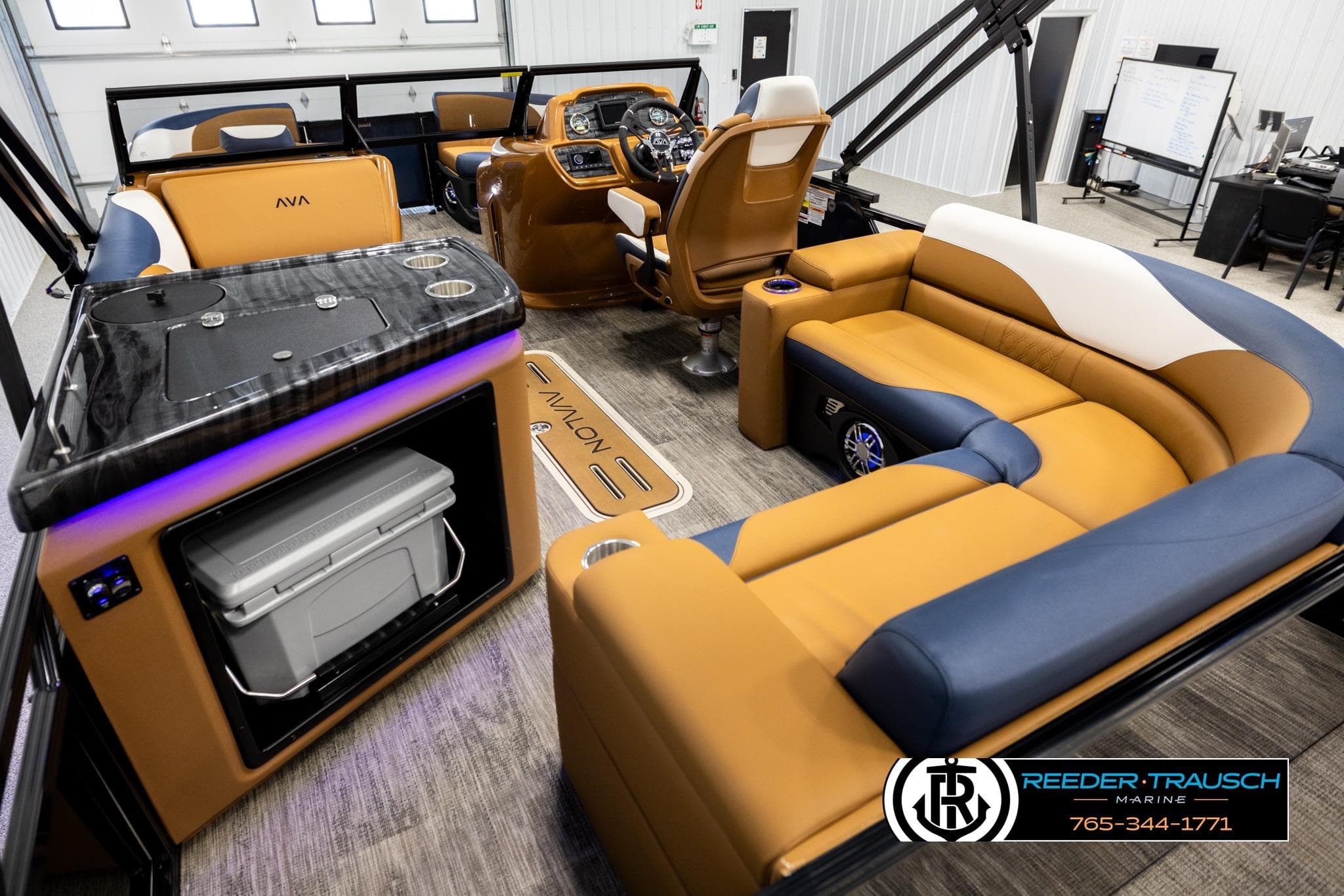 Luxurious interior of 2026 Avalon LSZ ELW pontoon boat with modern seating and amenities.
