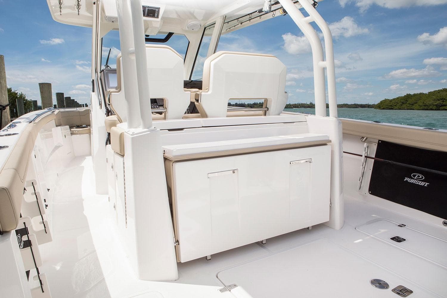 Manufacturer Provided Image: 2021 Pursuit S 328 Sport boat interior with seating and storage.